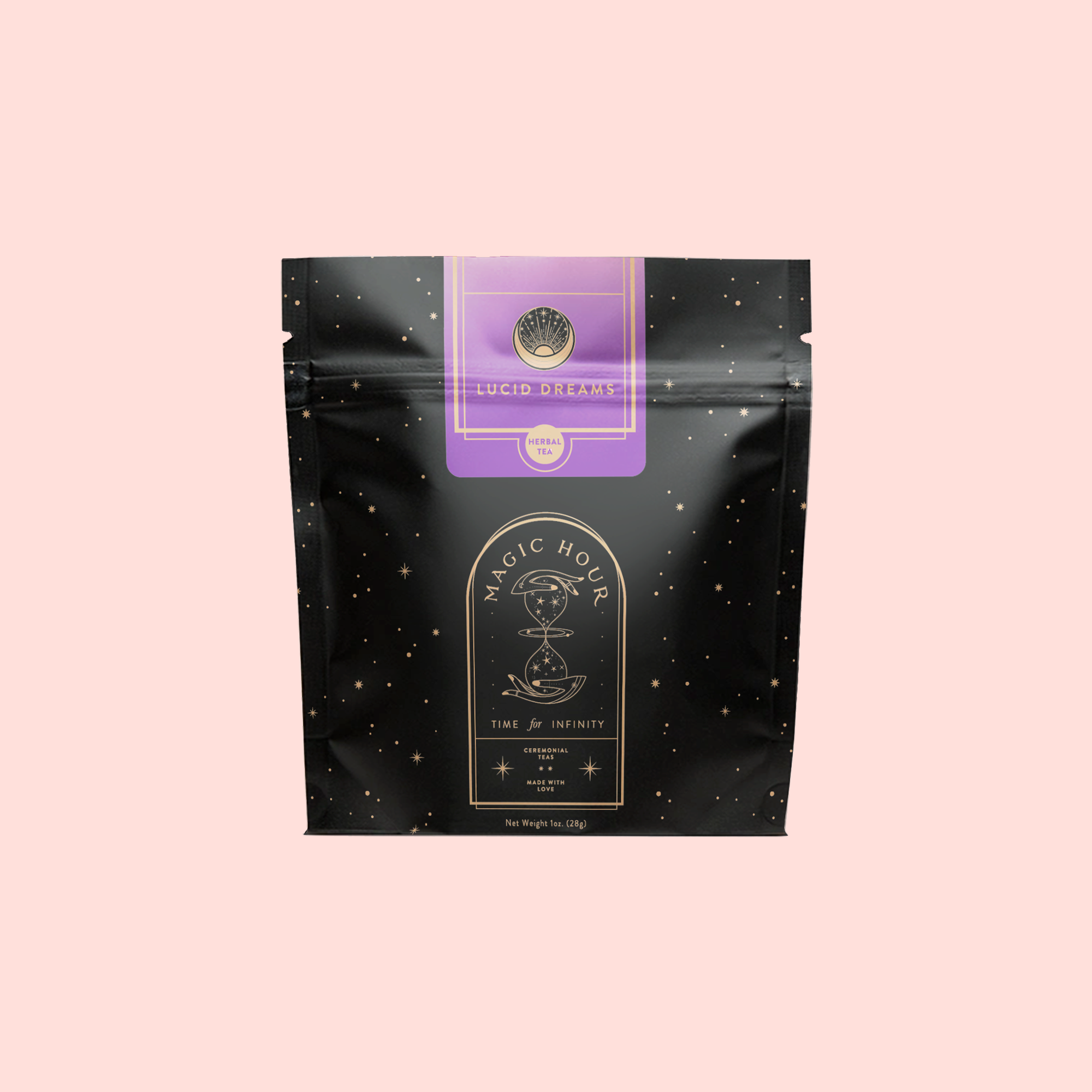 A black resealable tea bag with gold stars and a purple label reading "Lucid Dreams: Tulsi-Turmeric Herbal Tea for Sleep & Calm." The "Magic Hour" branding and celestial design make it perfect for enjoying soothing caffeine-free chai.