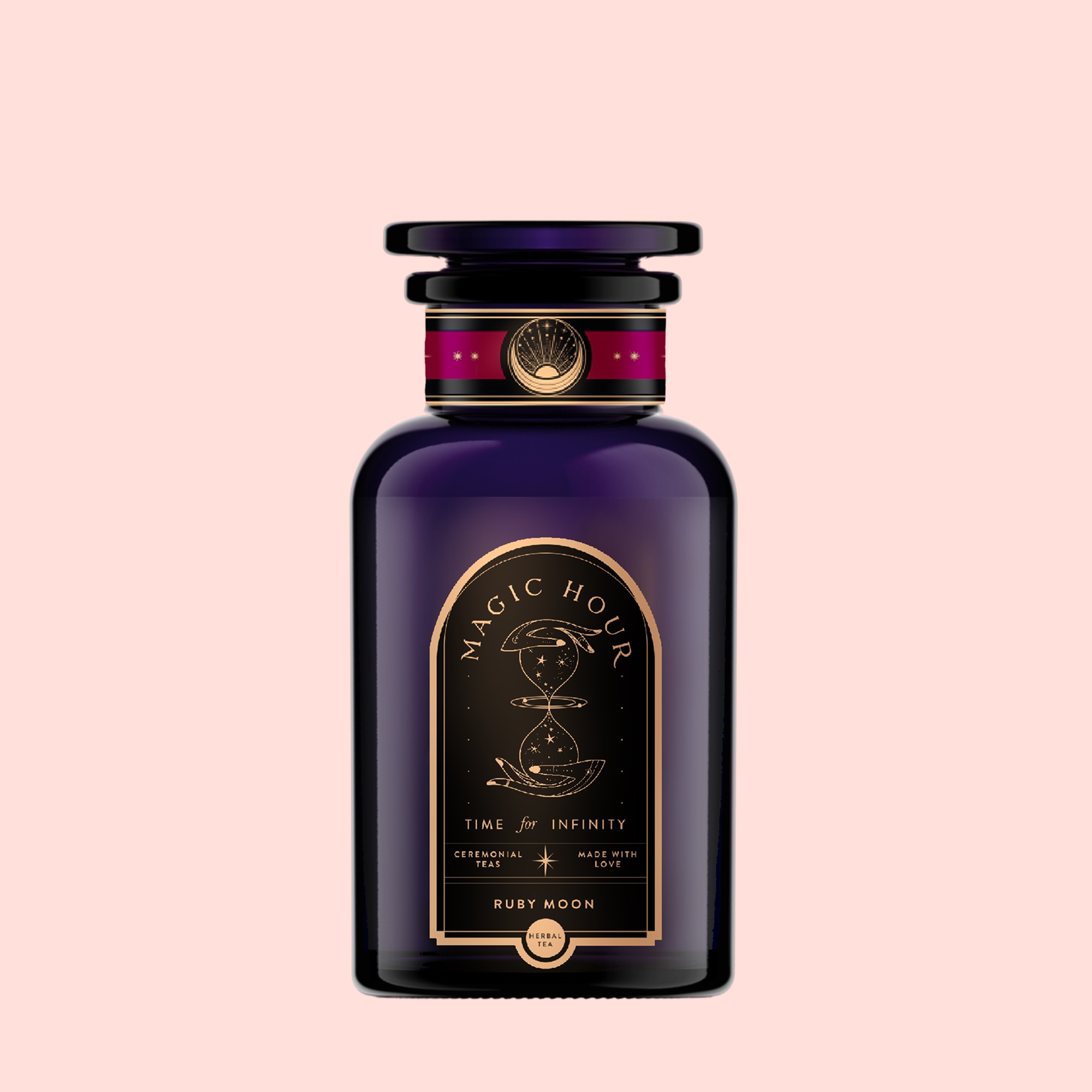 A dark purple, elegant bottle of Ruby Moon™: Hibiscus Elderberry Tea, adorned with gold accents and celestial motifs on a soft pink background, evokes the allure of a healing potion rich in vitamin C.