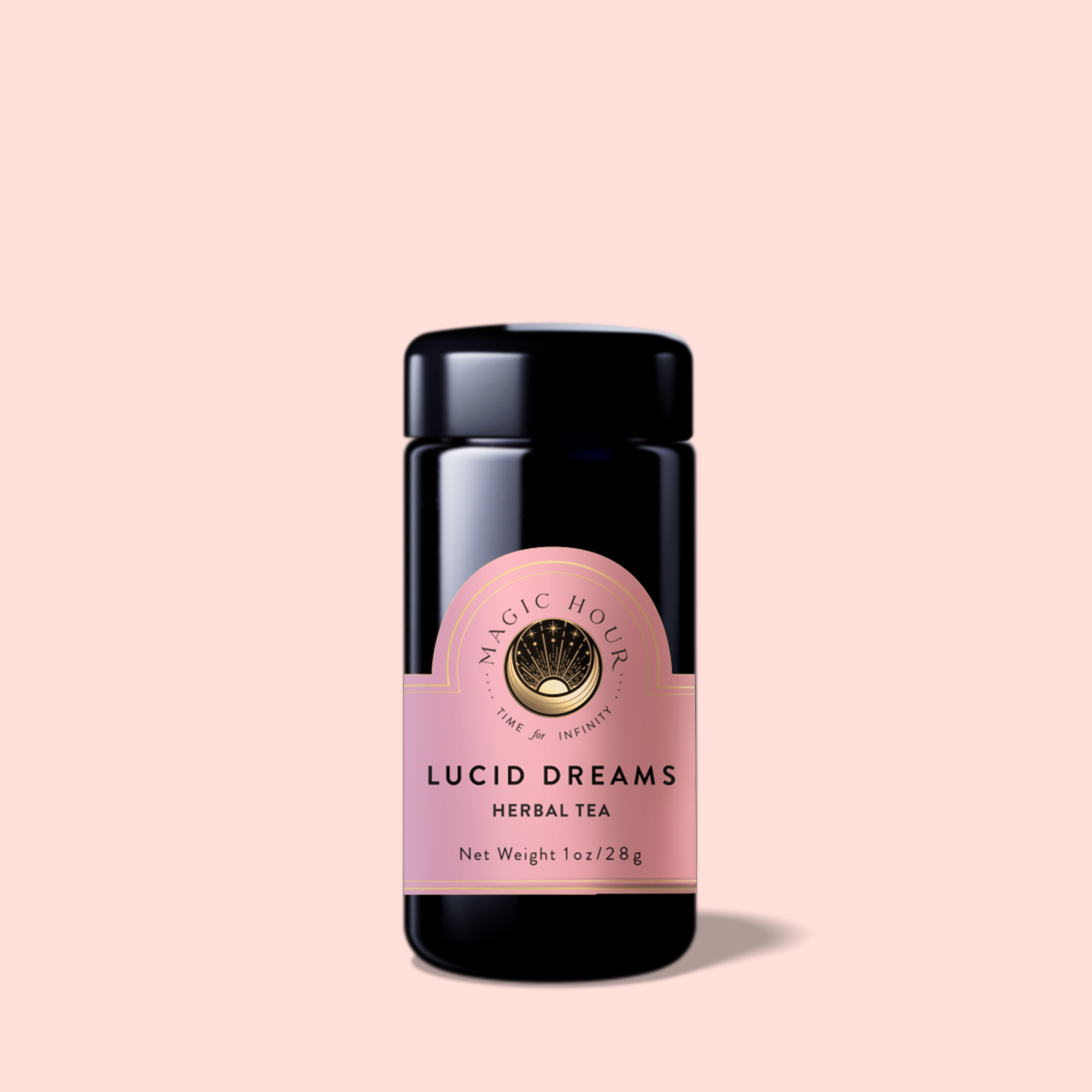 A dark glass jar with a pink label reading "Lucid Dreams: Tulsi-Turmeric Herbal Tea for Sleep &amp; Calm" and a gold emblem sits upright and centered against a light pink background, perfect for relaxing like a caffeine-free chai or calming tulsi tea.