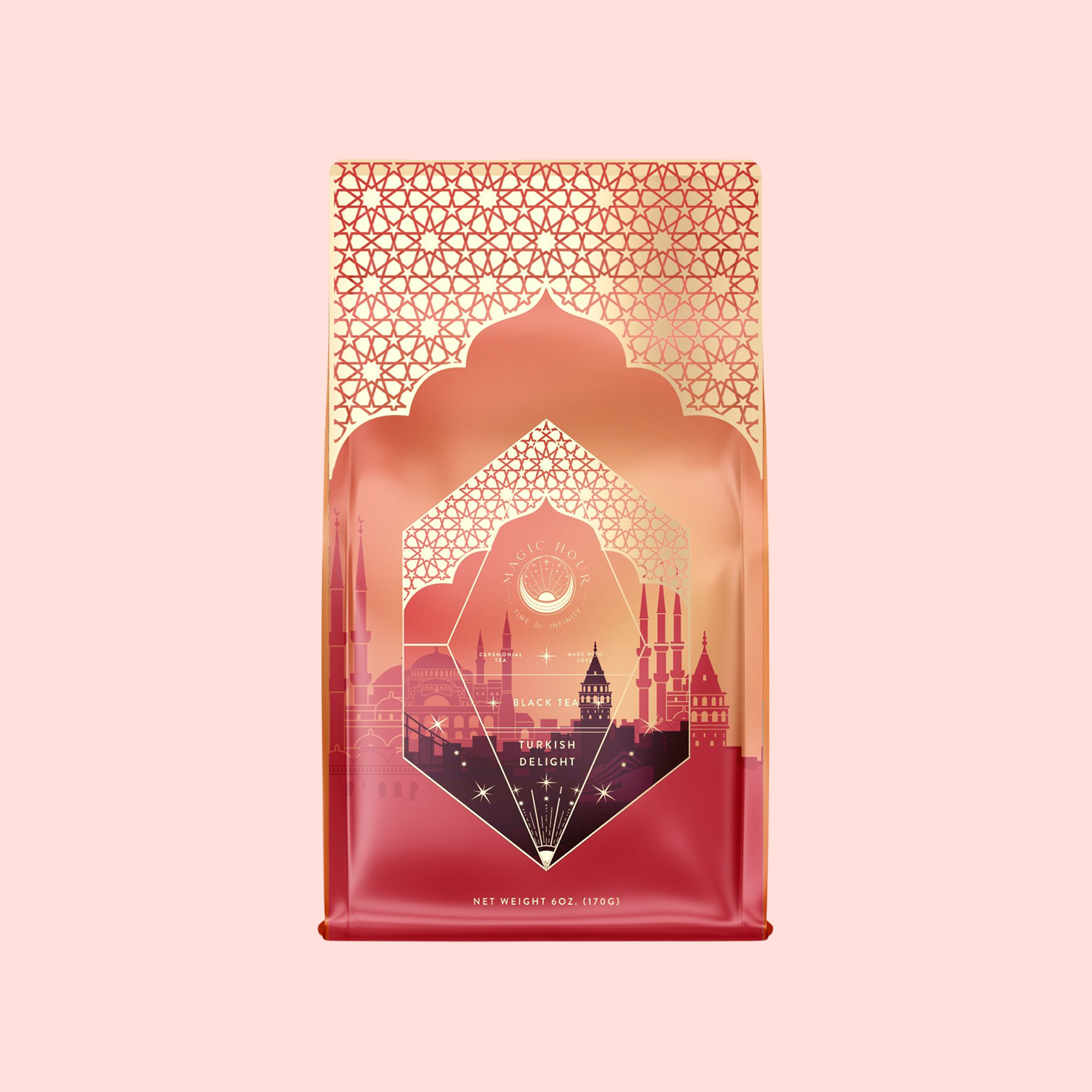 A decorative red and gold package of Turkish Delight with geometric mosque-inspired patterns, labeled “Turkish Delight,” evokes Istanbul vibes. Set against a light pink background. Net weight: 400g (17oz).