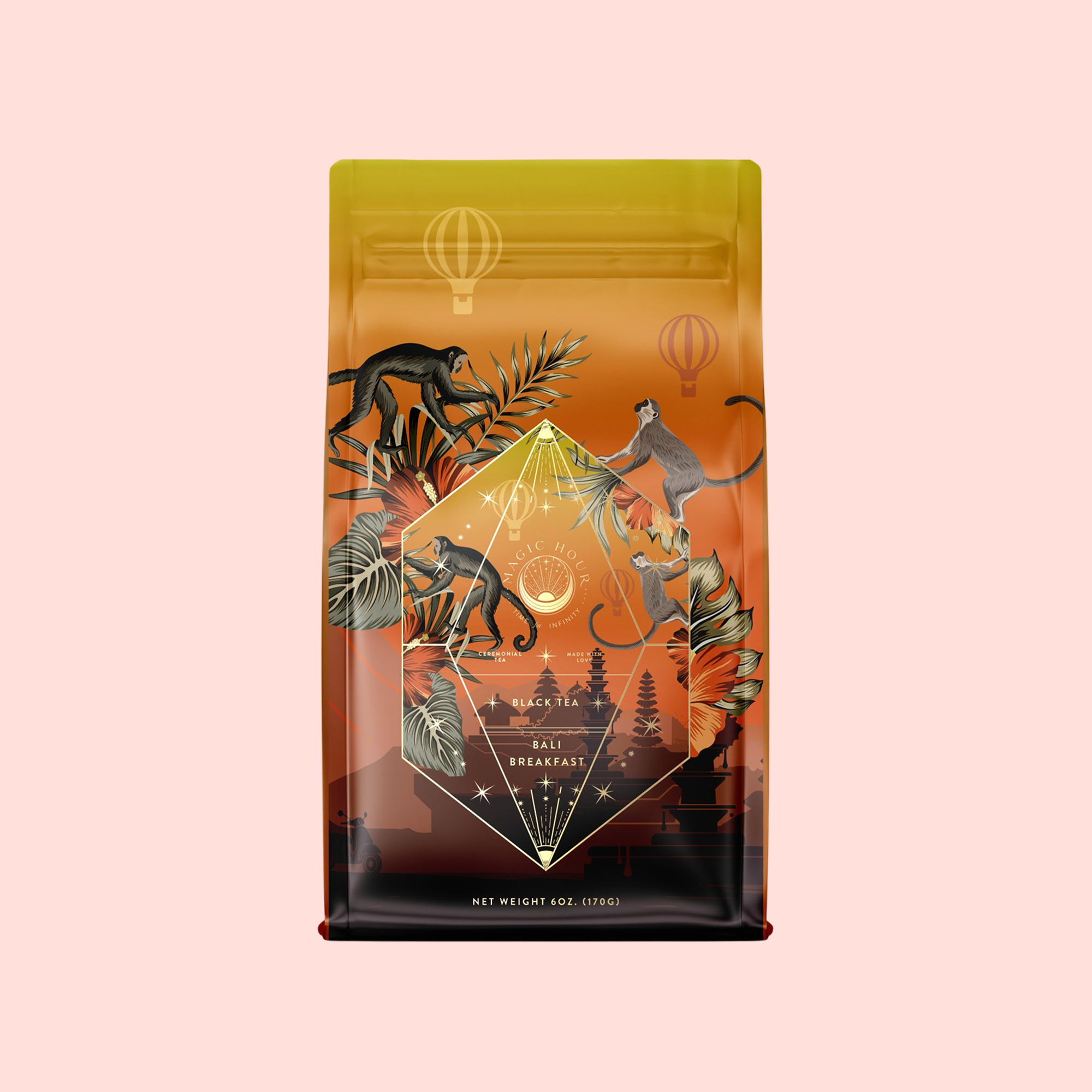 A vibrant coffee bag showcases illustrated monkeys, plants, and hot air balloons above a tropical scene. The geometric label reads "Bali Bliss: Coconut-Lime & Ginger-Melon White Tea," capturing the lively essence of this Bali tea blend.
