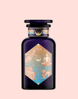 A dark purple Thai Temple Tea perfume bottle with a gold and pastel label featuring a meditating figure, architectural and celestial designs inspired by immune-supporting Star Anise, set against a light pink background.