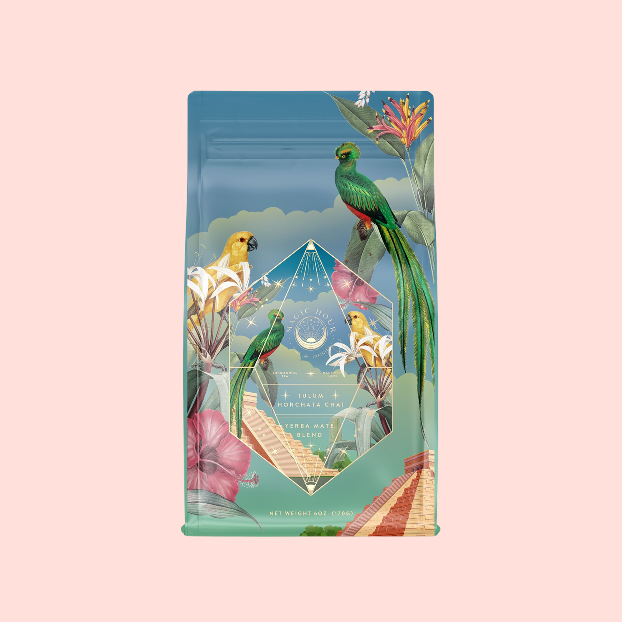 A vibrant coffee bag for Tulum Horchata Chai shows illustrated parrots, tropical flowers, and leaves, with a central geometric diamond and pyramid steps below, celebrating adaptogenic wellness blends on a light pink background.