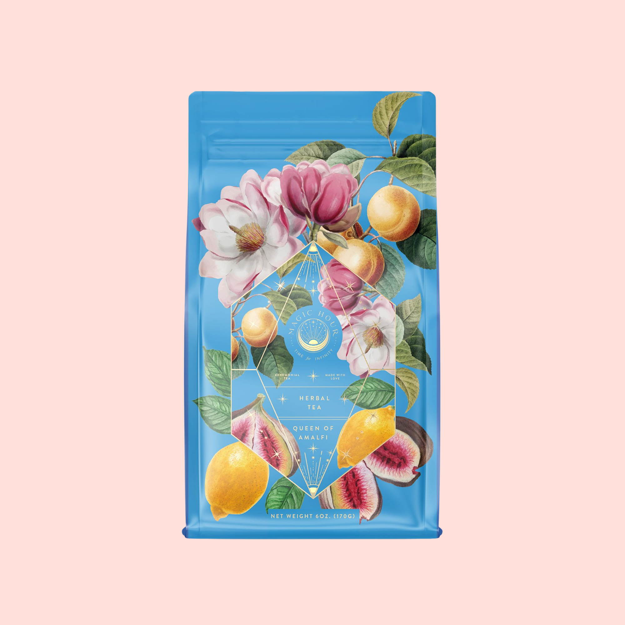 A blue tea packet with floral and fruit illustrations, including magnolia, figs, and green leaves. The label reads "Herbal Tea, Summer in Amalfi," featuring Mediterranean notes and organic lemon peel.