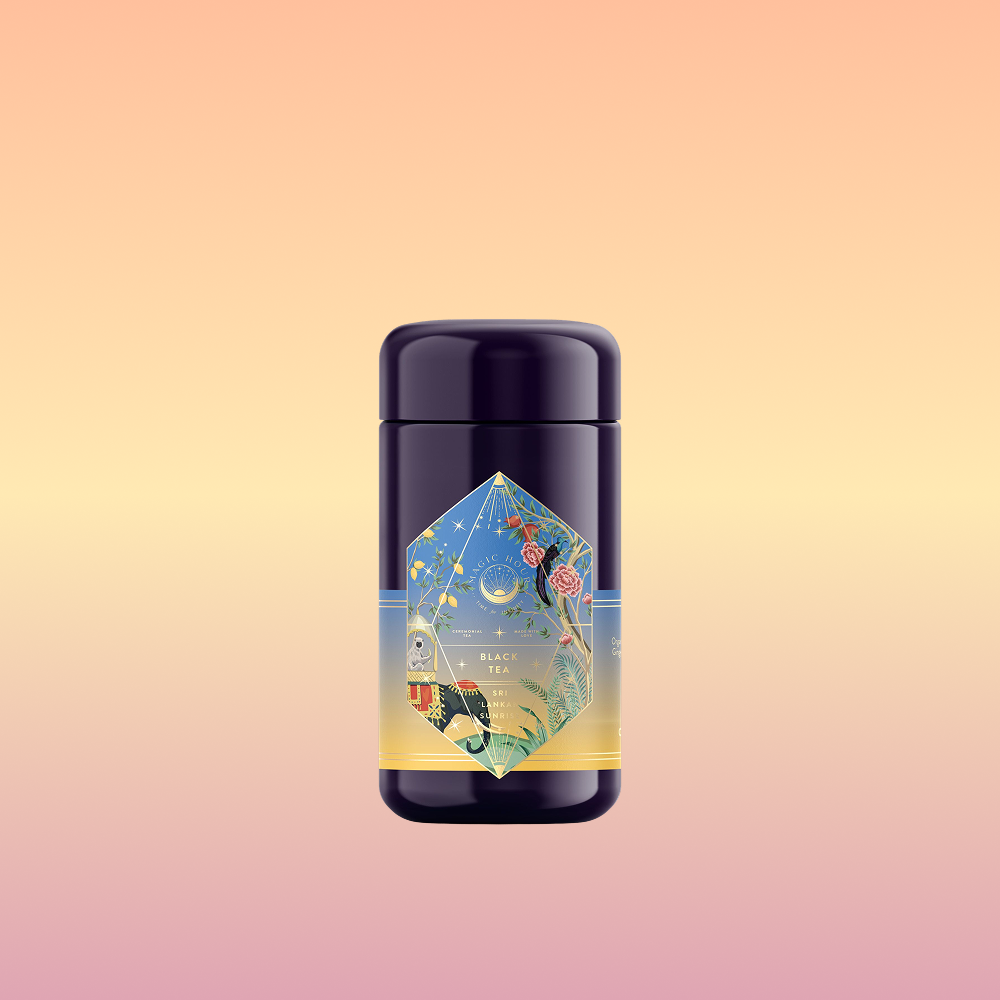 Sri Lankan Sunrise is a dark cylindrical tea canister with a vibrant geometric label of celestial, floral, and architectural designs on a peach-yellow gradient, hinting at the exquisite breakfast tea inside.