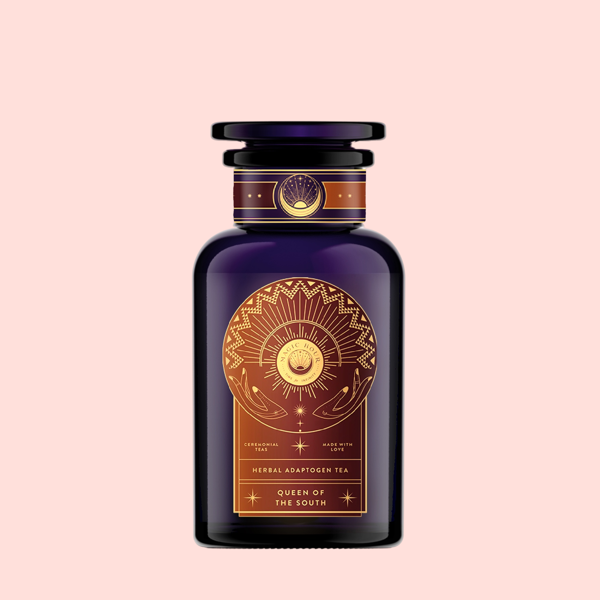A dark purple glass bottle with a gold-embellished label featuring a sun, moon, and hands, labeled "Queen of the South Cocoa Detox Tea," a caffeine-free blend inspired by Café de Olla, set against a pale pink background.