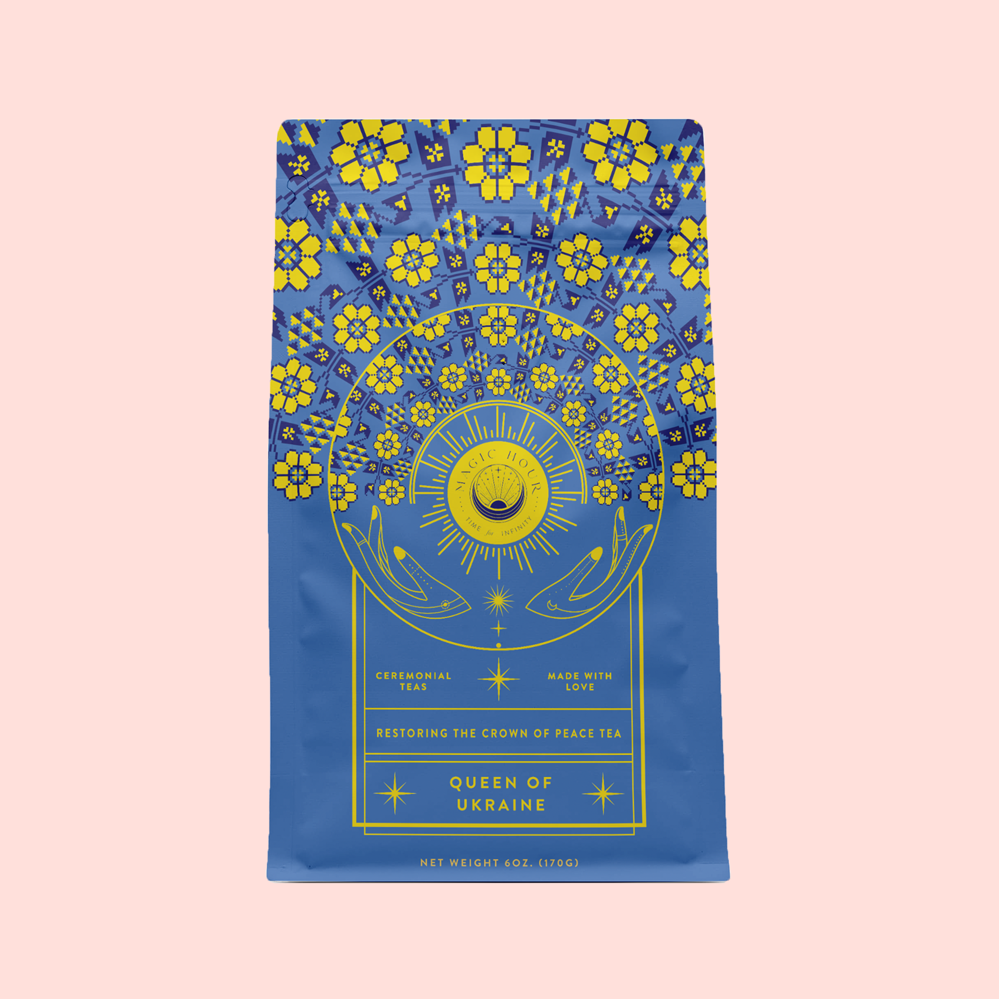 A blue tea package with ornate yellow floral and sunburst patterns reads “Queen of Ukraine: Spring Blossom Tea,” set against a pastel pink background.
