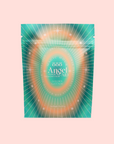 A teal and orange gradient pouch labeled "888: Lemon-Jasmine-Vanilla Herbal Tea" with radiating lines and star accents, inspired by Archangel Michael, set against a pale pink background.