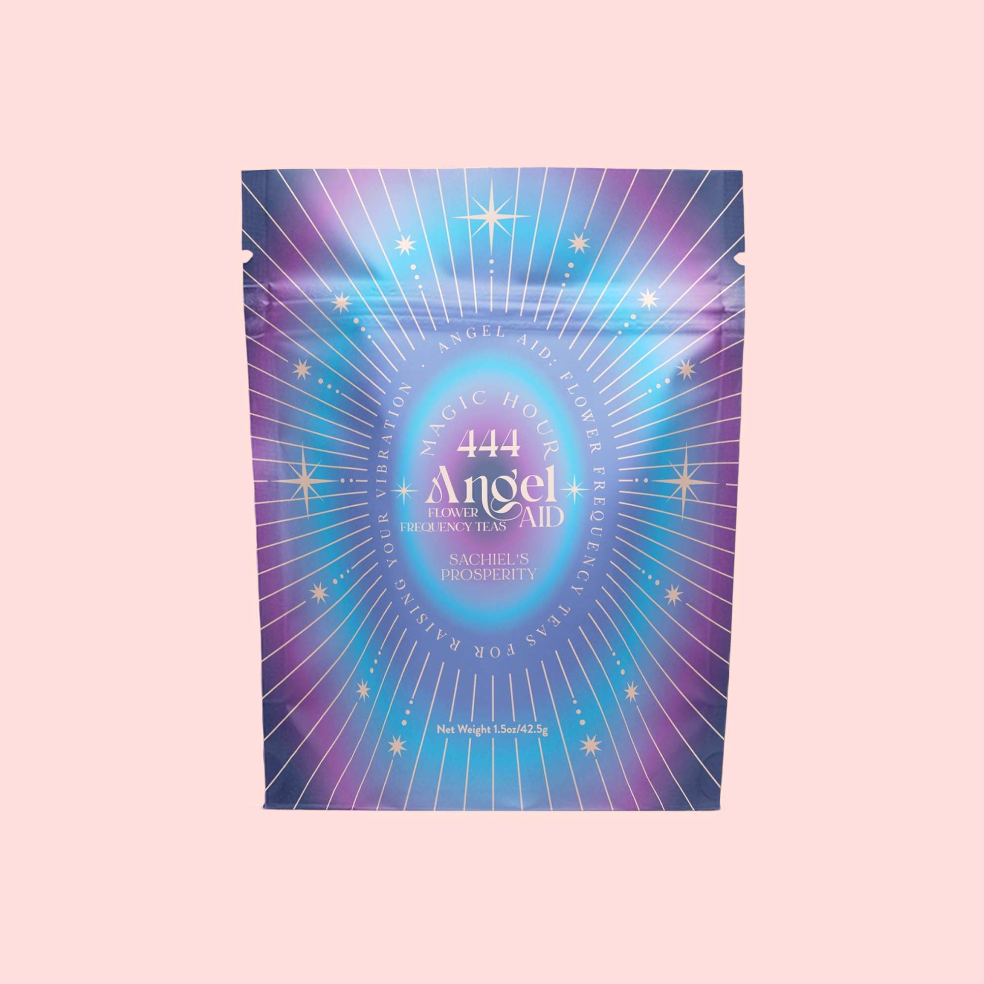 A vibrant sachet labeled "444: Sachiel's Prosperity: Apple-Berry Herbal Tea with Butterfly Pea Flower and Blue Spirulina," adorned with starburst and stars on a blue-purple gradient, set against a light pink background.