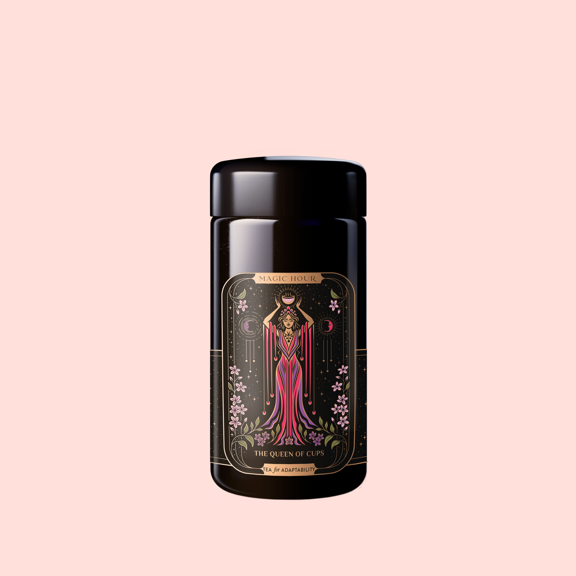 The Queen of Cups: Hibiscus-Vanilla-Berry Tea for Balance &amp; Heart Health comes in a black canister featuring an illustrated woman in a flowing red dress with floral designs on a pale pink background—perfect for emotional balance.