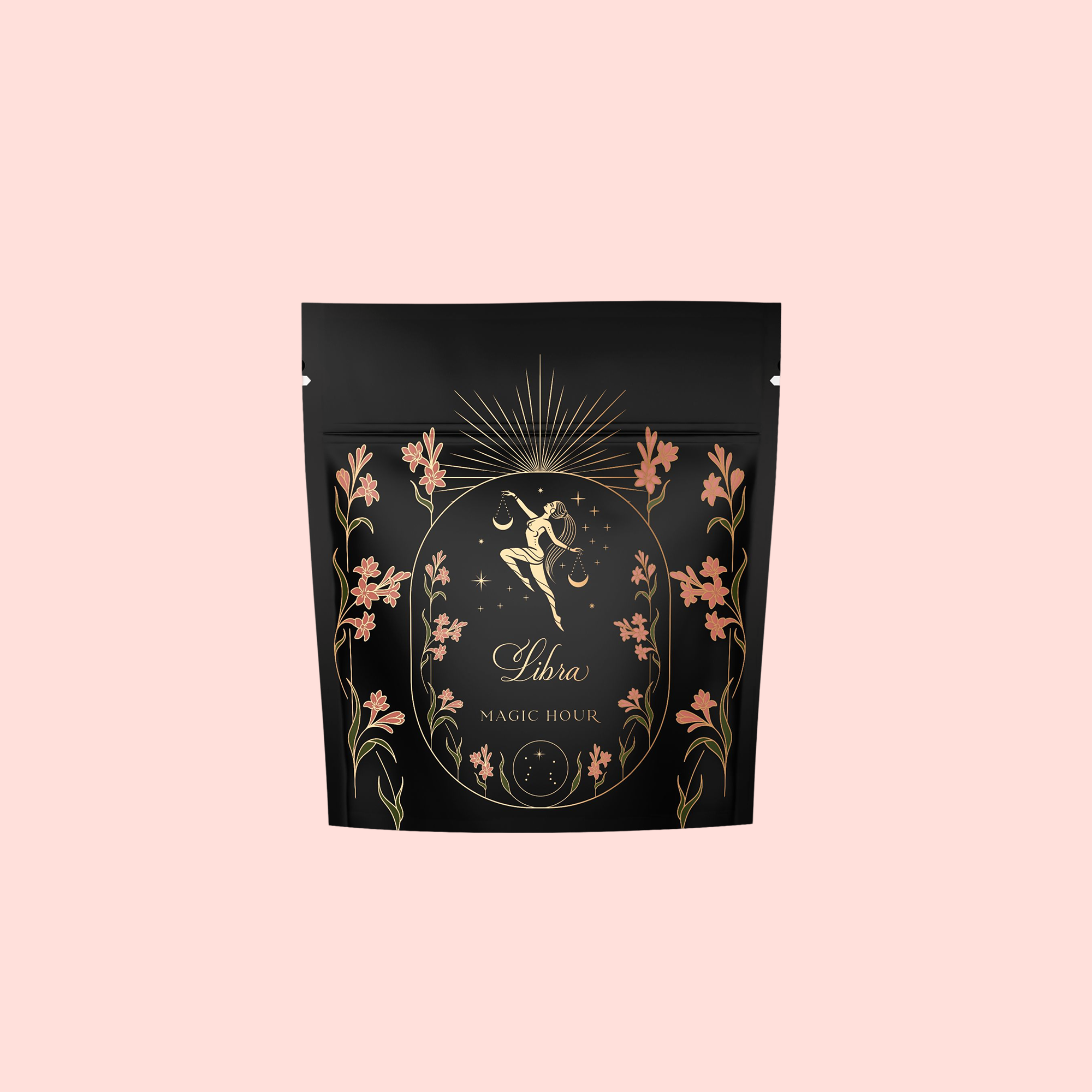 A black resealable pouch with gold and pink floral designs, featuring a gold figure holding scales, labeled “Libra Shatavari-Cardamom-Rose White Love Cake Tea,” evokes the enchanting aroma of rose and pistachio.