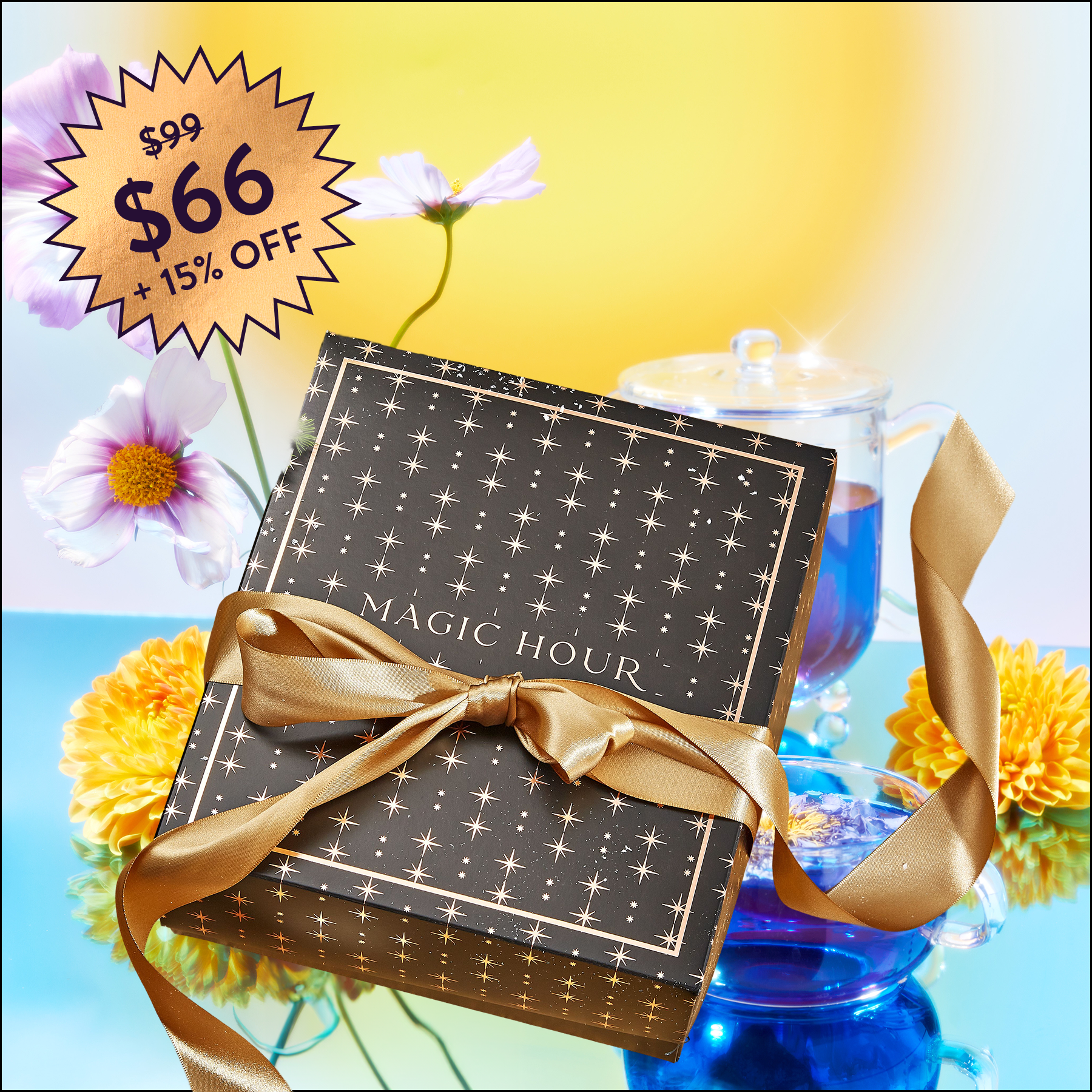 The Memorial Day Mystery Box, featuring luxury teas, flowers, star-patterned packaging with a gold ribbon, and Magic Hour accessories, is showcased with a $99 tag ($66 + 15% OFF) against a bright sunny background.