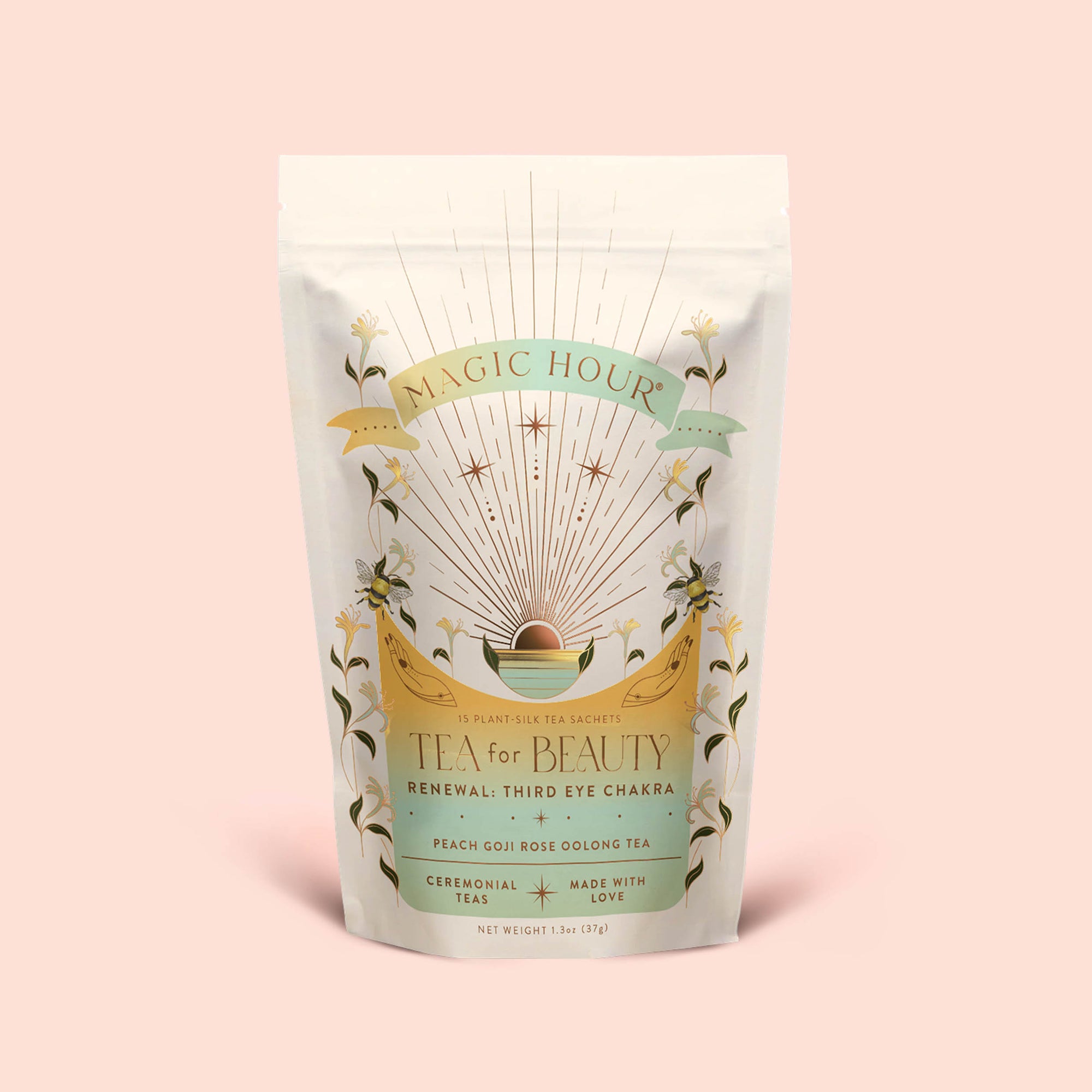 A pastel-toned pouch labeled “Tea for Beauty: Renewal: Peach, Goji &amp; Rose Oolong Tea” features floral patterns, gold accents, and an egg illustration. The packaging details a ceremonial oolong tea blended with juicy goji berries and rose, emphasizing renewal and love.