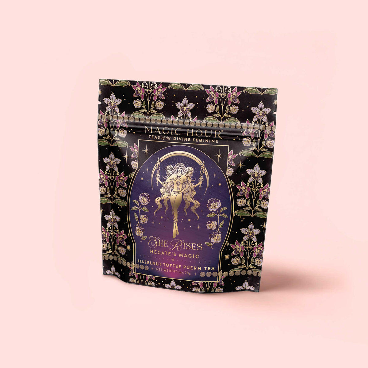 A floral tea package labeled “Monthly Magic Tea Journey Subscription” with an illustrated goddess—perfect for ritual tea—set against a pale pink background.
