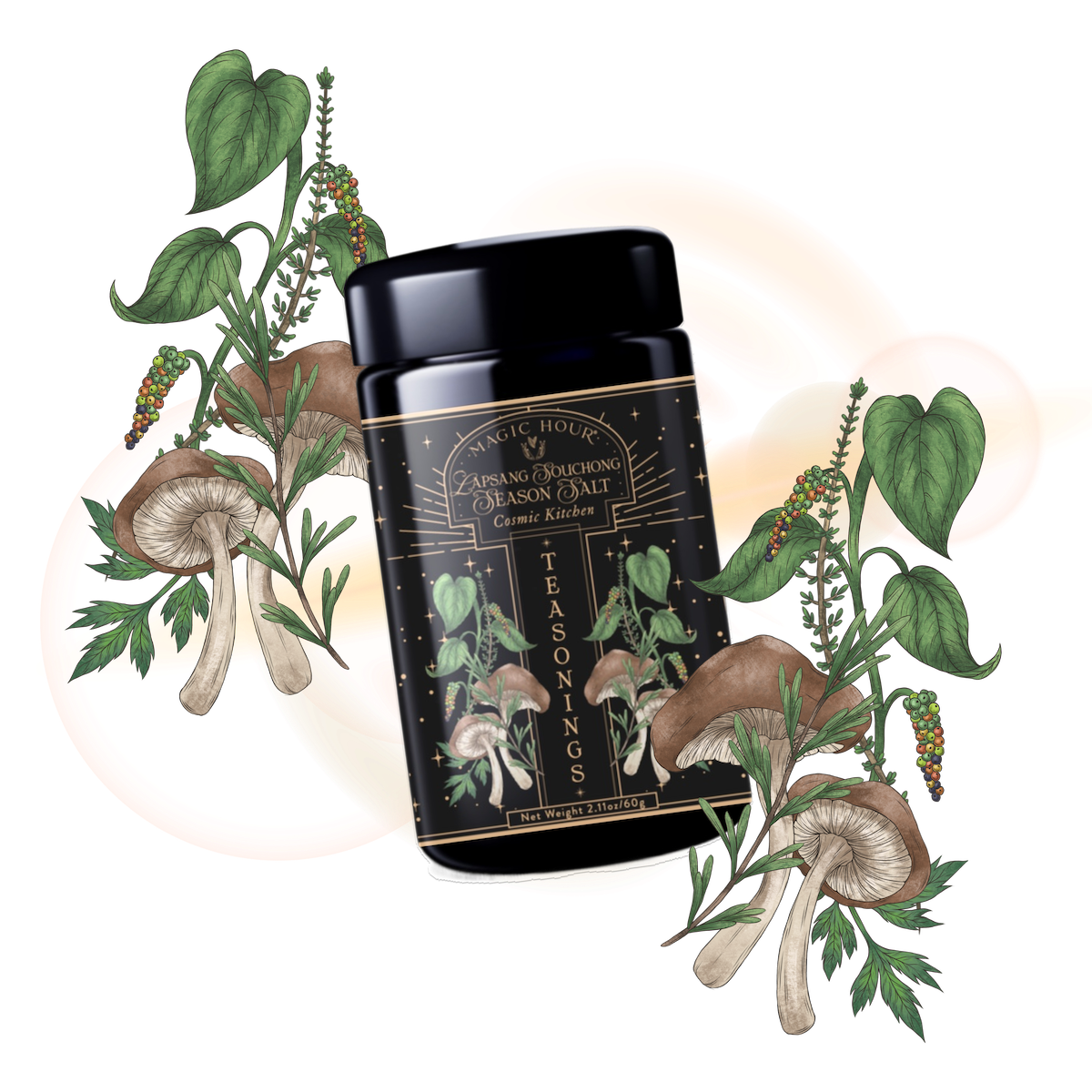 A black jar labeled "Lapsang Souchong Season Salt" features illustrated mushrooms and green leaves on a light background—perfect for seasoning mushrooms or adding a smoky twist to black tea.
