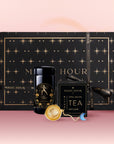 The Leo Astrology Tea Gift Set includes a decorative tea jar, Magic Hour Opal Moon Tea Infuser, tea infuser ball, and star-patterned box—an elegant gift for astrology tea lovers, beautifully arranged on a pink gradient background.