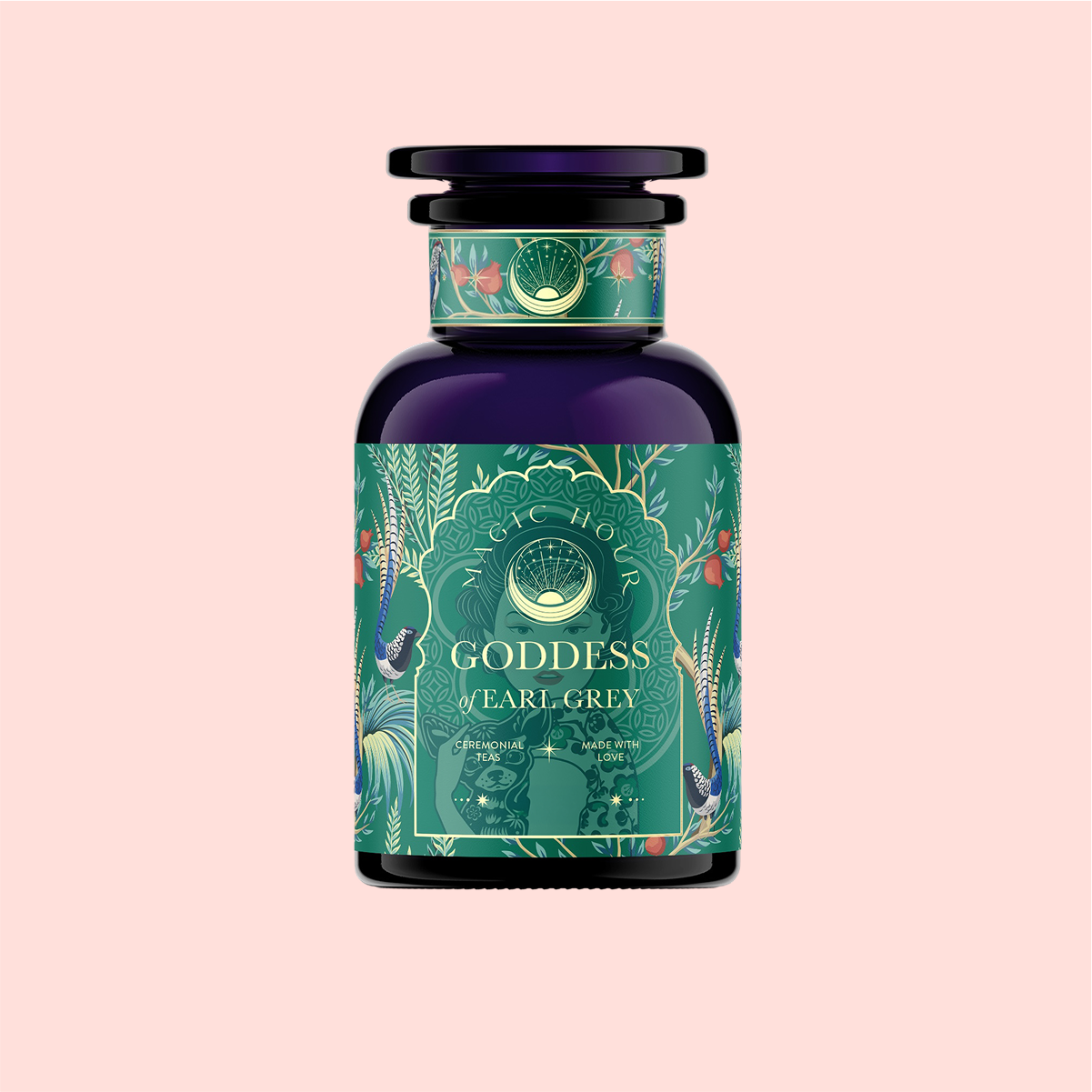 Bottle of &quot;London Fog Oolong&quot; tea with a dark purple hue and an ornate, colorful label showcasing botanical illustrations of leaves and birds. Enhanced with a hint of bergamot, the rich detailing complements its luxurious design.