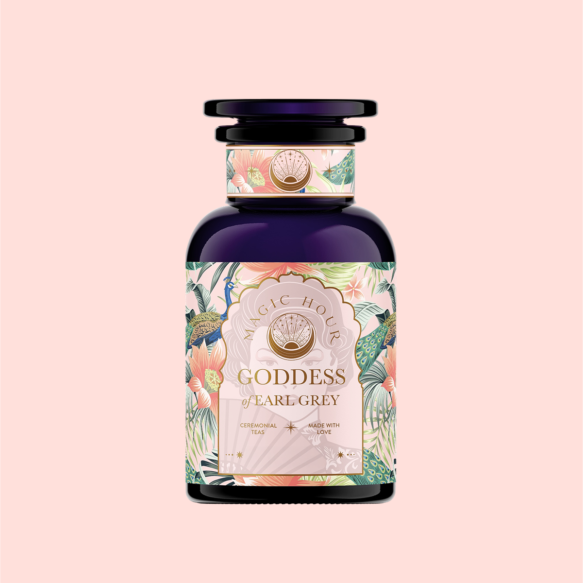 A dark blue bottle labeled &quot;London Fog White&quot; with a floral and botanical design, featuring bergamot hints, set against a soft pink background.