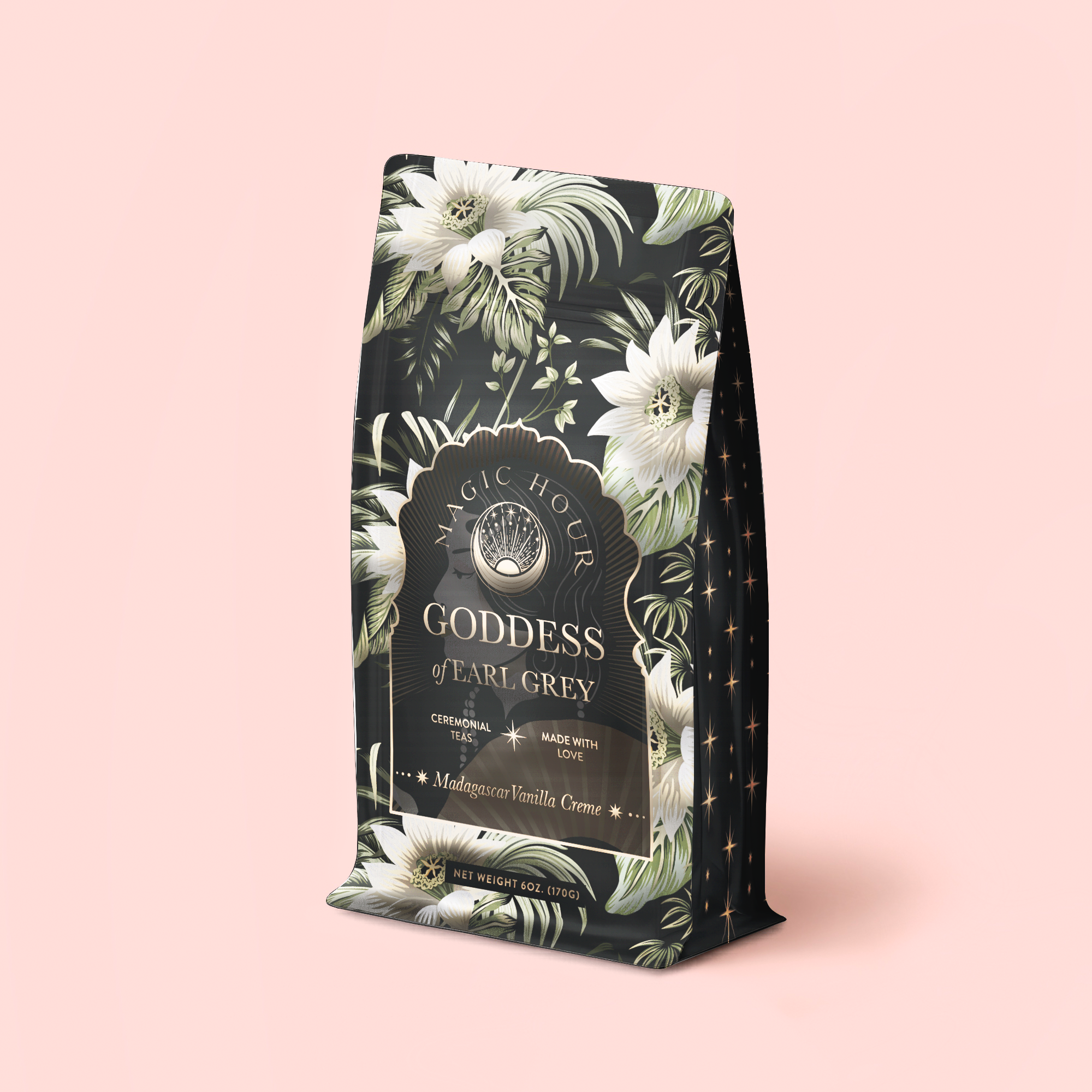 A standing organic black tea refill pouch labeled "Madagascar Vanilla Earl Grey Creme," adorned with white tropical flower illustrations and featuring notes of vanilla and cream, set against a light pink background.