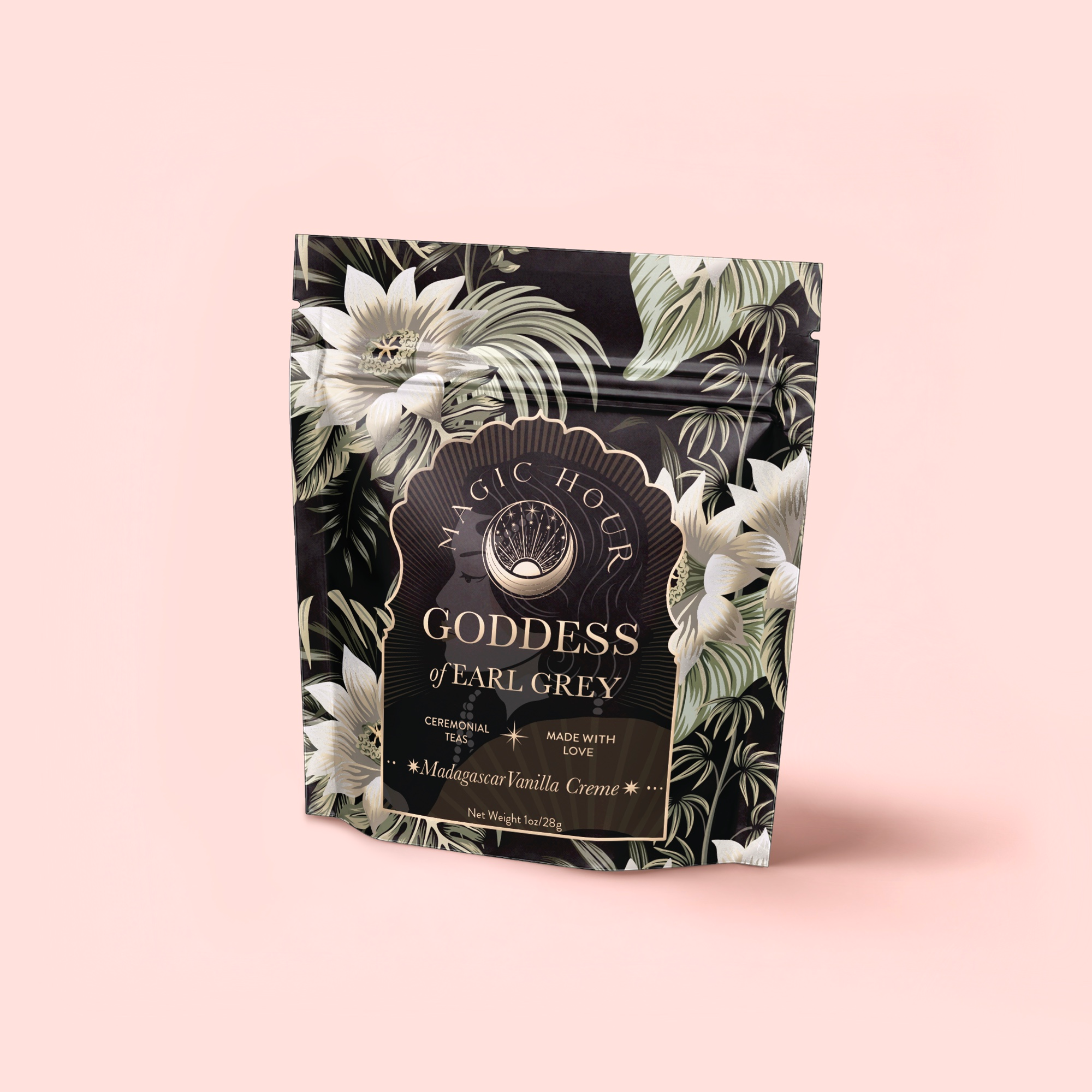 A pale pink package labeled "Goddess of Earl: Madagascar Vanilla Creme Tea for Soothing Delight & Delicious Decadence" features floral patterns and highlights a rich bergamot vanilla tea with ceremonial and loving details.