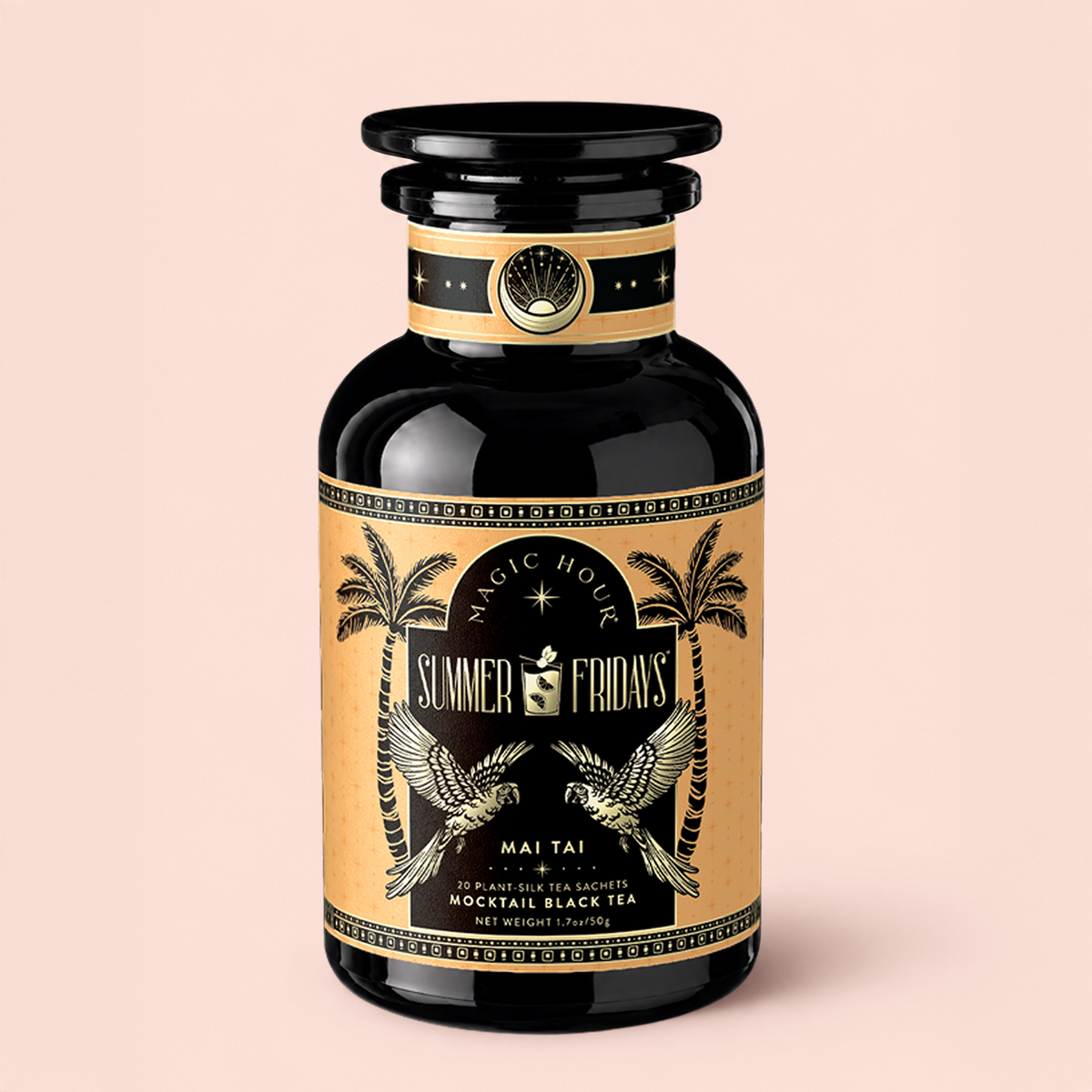 A black bottle with gold accents, palm trees, and cockatoos holds 20 plant-based sachets of “Mai Tai: Black &amp; Puerh Tropical Mocktail Tea for Energizing Your Season of Sunshine.” This summer-inspired tea blend features notes reminiscent of Mai Tai cocktails and Puerh black tea. The set is displayed against a pale pink background.
