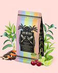 A vibrant bag of Mai Tai: Black & Puerh Tropical Mocktail Tea for Energizing Your Season of Sunshine is surrounded by illustrated tropical fruits and lush leaves—featuring cherries, lime, pineapple, and orange slices—set against a soft pink background to evoke the refreshing spirit and lively summer vibes of this cocktail-inspired tea blend.
