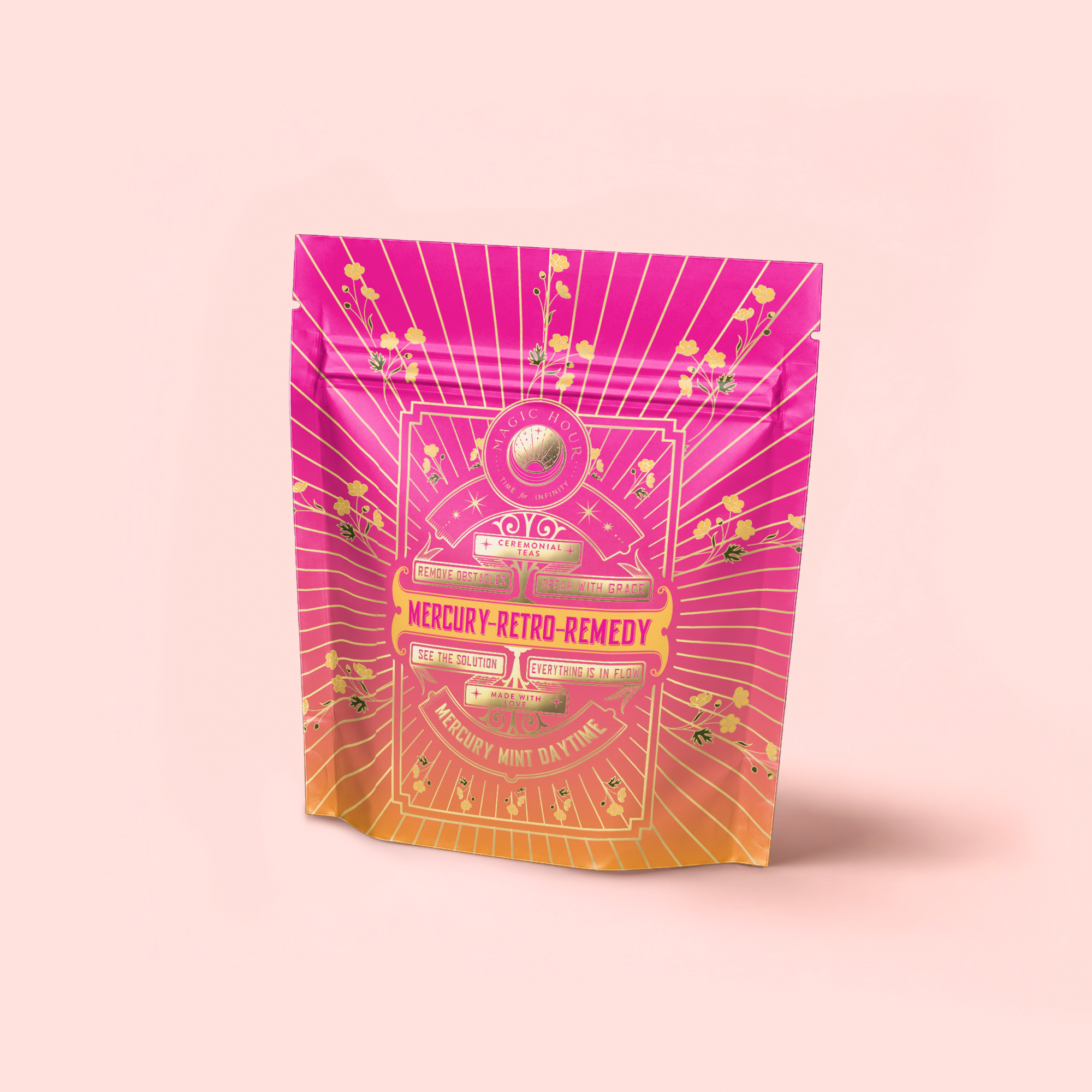 A vibrant pink and orange resealable pouch labeled "Mercury Mint Daytime: Vanilla Mint Lavender Jasmine Black Tea," with decorative gold and white celestial designs—perfect for storing your favorite tea blend.
