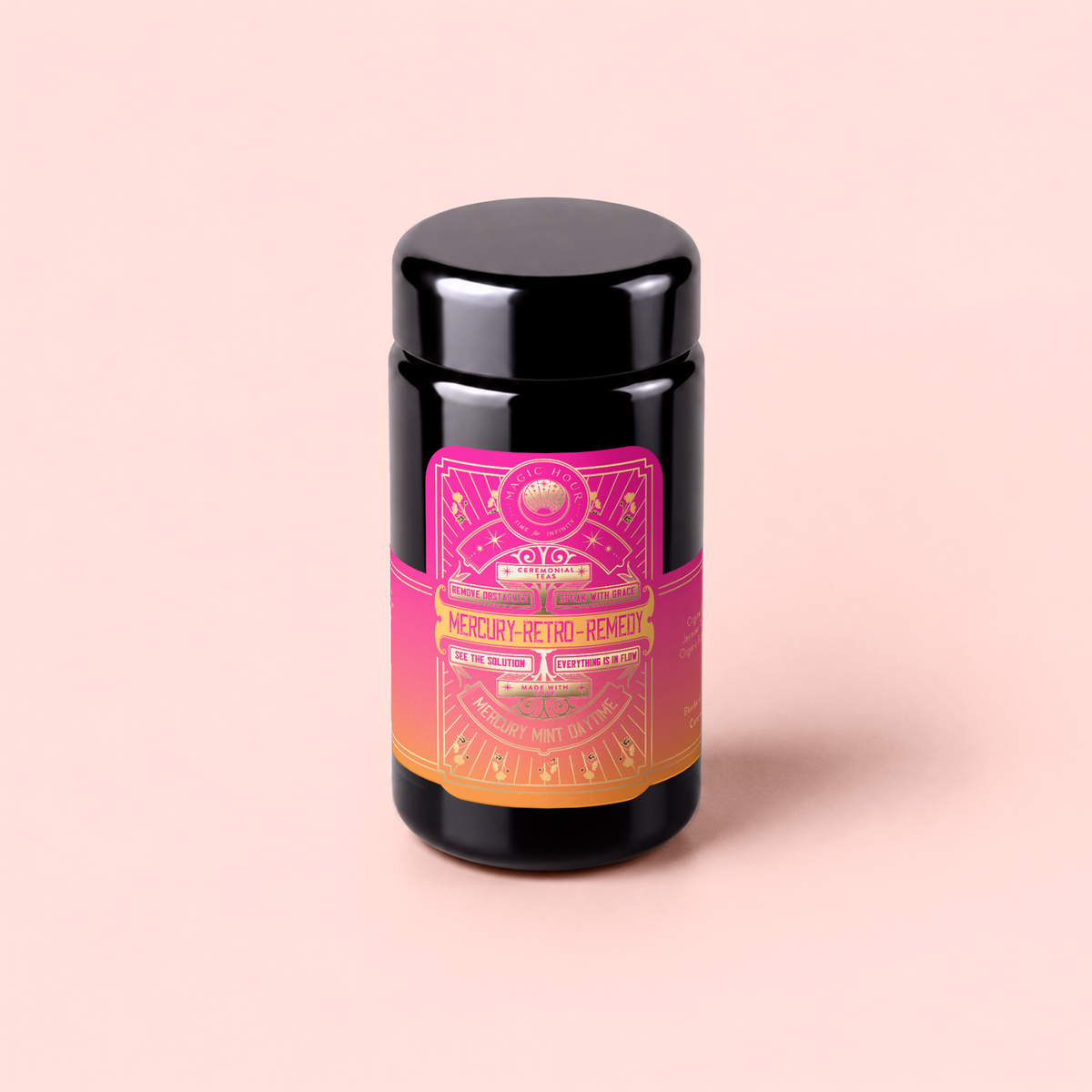 A black jar with a vibrant pink and orange label reading “Mercury Mint Daytime” on a light pink background. The label features decorative designs and mystical symbols, hinting at the soothing blend of vanilla mint, lavender, jasmine, and biodynamic black tea infused within.
