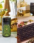 A collage of tea-themed items showcases a green-labeled tea container, a gold infuser with a starry black box labeled "Magic Hour," and a larger "Magic Hour" box. Vibrant Wellness is celebrated through decorative gold, floral elements, and the serene glow of the Peridot August Birthstone Mini Gift Set.