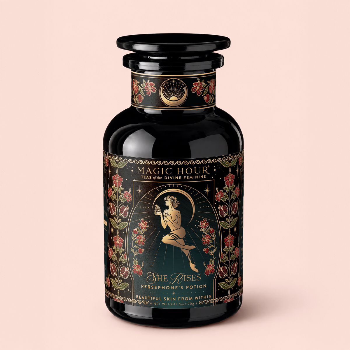 A black decorative tea jar labeled “Persephone’s Potion: Pomegranate & Jasmine Green Tea,” adorned with gold accents, floral illustrations, and an image of a winged woman holding a flower. This enchanting jar evokes the allure of pomegranate and jasmine green tea, inviting you to indulge in a magical blend both inside and out.