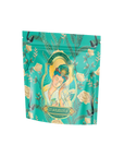 A teal pouch showcases a serene woman holding a flower, framed by floral and vine patterns, echoing the calming essence of Quan Yin Oolong. Below, "Compassion" reflects the product name: Compassion: Quan Yin Original Style Oolong.