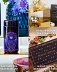 A collage featuring the Sapphire September Birthstone Mini Gift Set, which includes a Sapphire Wellness Tea Traveler Jar, an Opalite Moon Tea Strainer with a tin, and a Magic Hour Branded Gift Box. This gemstone-inspired tea ritual collection is elegantly displayed with decorative elements for a sophisticated touch.