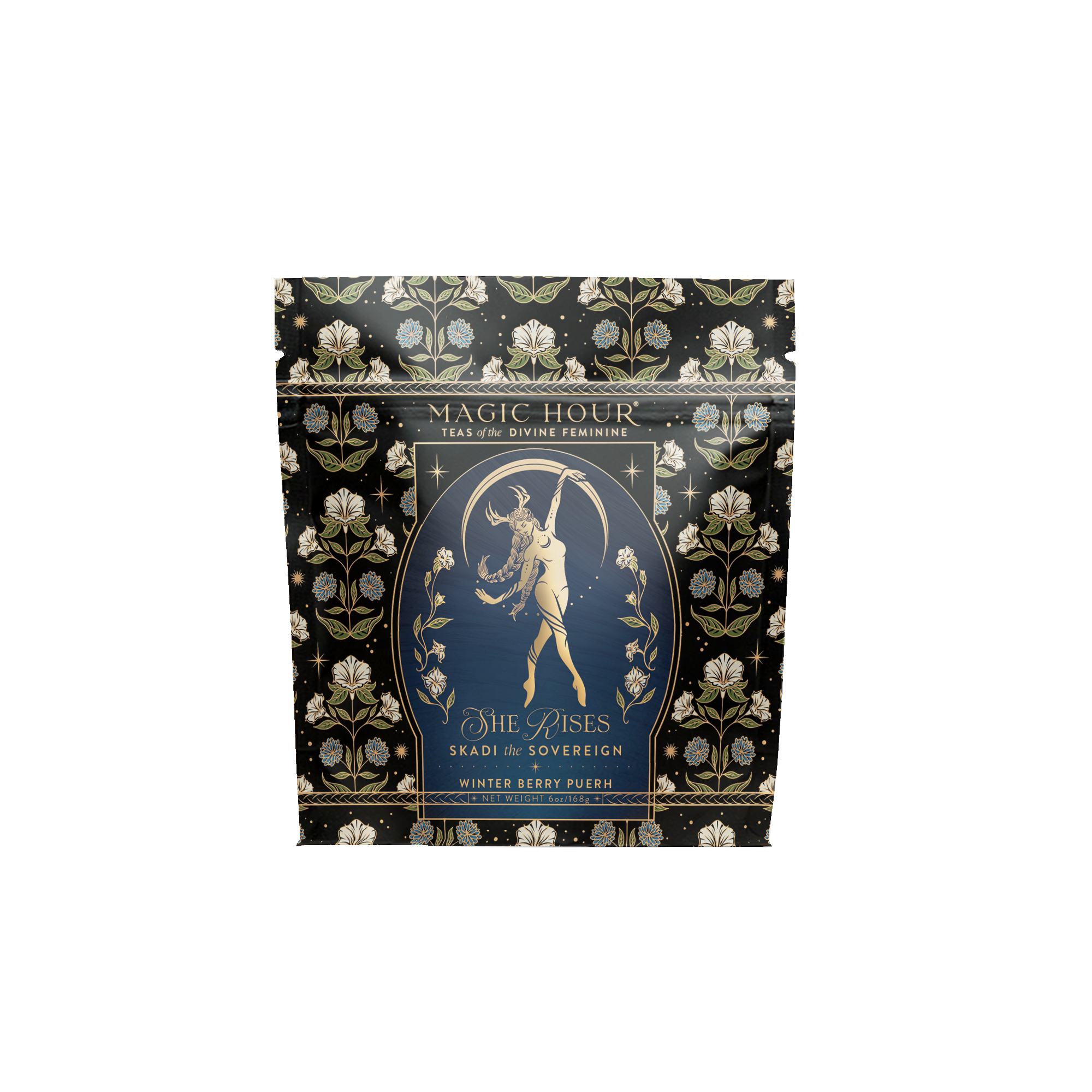 A black floral pouch labeled “Magic Hour: Teas of Divine Feminine” features a gold-outlined figure and the text “She Rises, Skadi The Sovereign,” celebrating Skadi with berry-infused puerh tea.