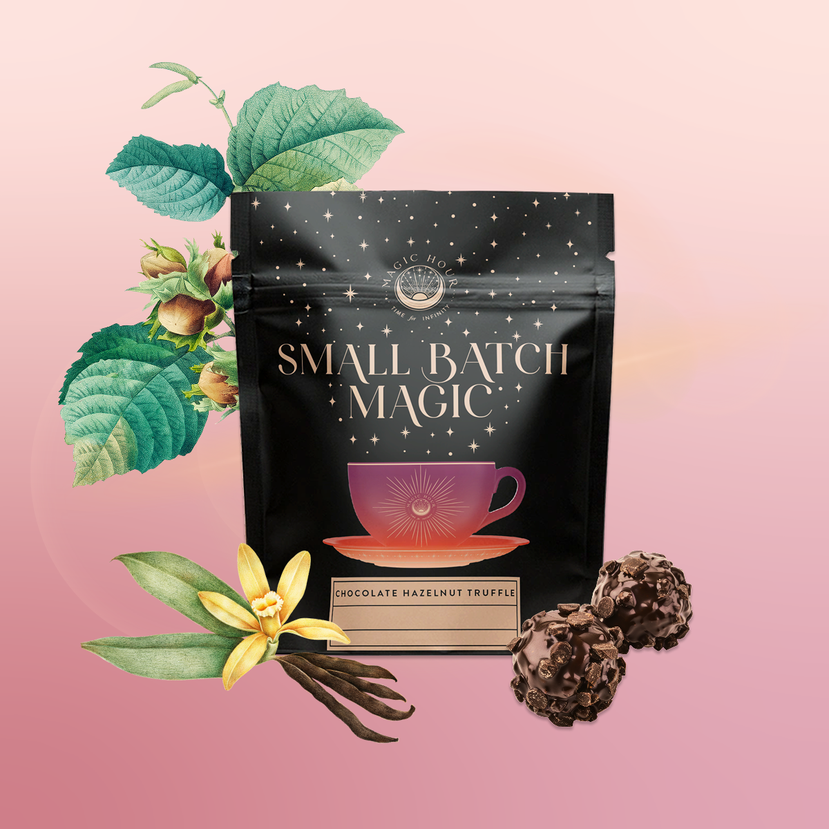 A black pouch labeled "Small Batch Magic Valentine’s 2026" stands upright amid hazelnuts, a vanilla flower, vanilla beans, and chocolate truffles—evoking the indulgent aroma of Madagascar vanilla rooibos—on a soft pink gradient background.