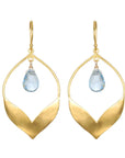 Introducing the Spring Lotus Earrings, a stunning pair of 18kt gold-plated drop earrings showcasing a leaf-like open design with a teardrop-shaped blue topaz gemstone elegantly suspended in the center of each.