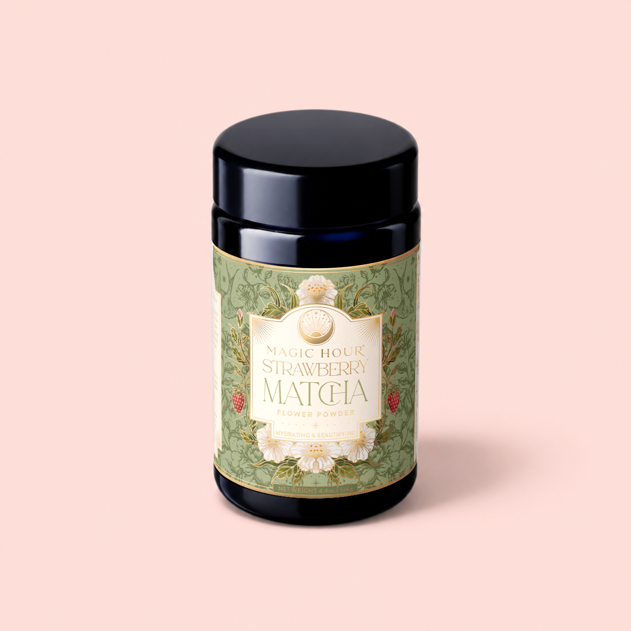 A jar of Flower Powder: Strawberry Matcha, featuring a green and floral label, rests on a light pink background, showcasing this beauty food blend crafted from premium ceremonial matcha and juicy strawberries.