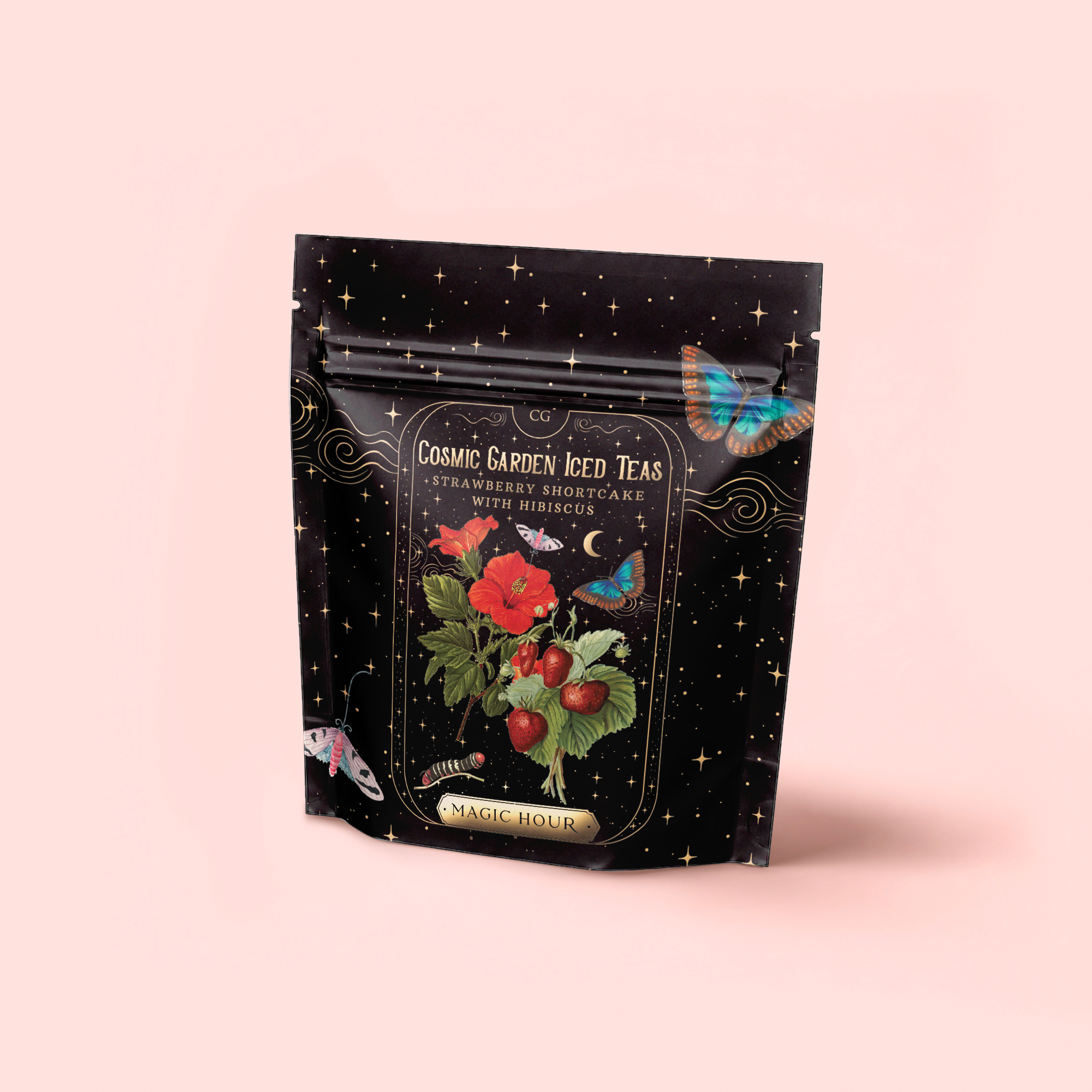 A black resealable pouch labeled “Strawberry Shortcake Iced Tea with Hibiscus” displays strawberries, hibiscus flowers, butterflies, and stars illustrations on a pale pink background.