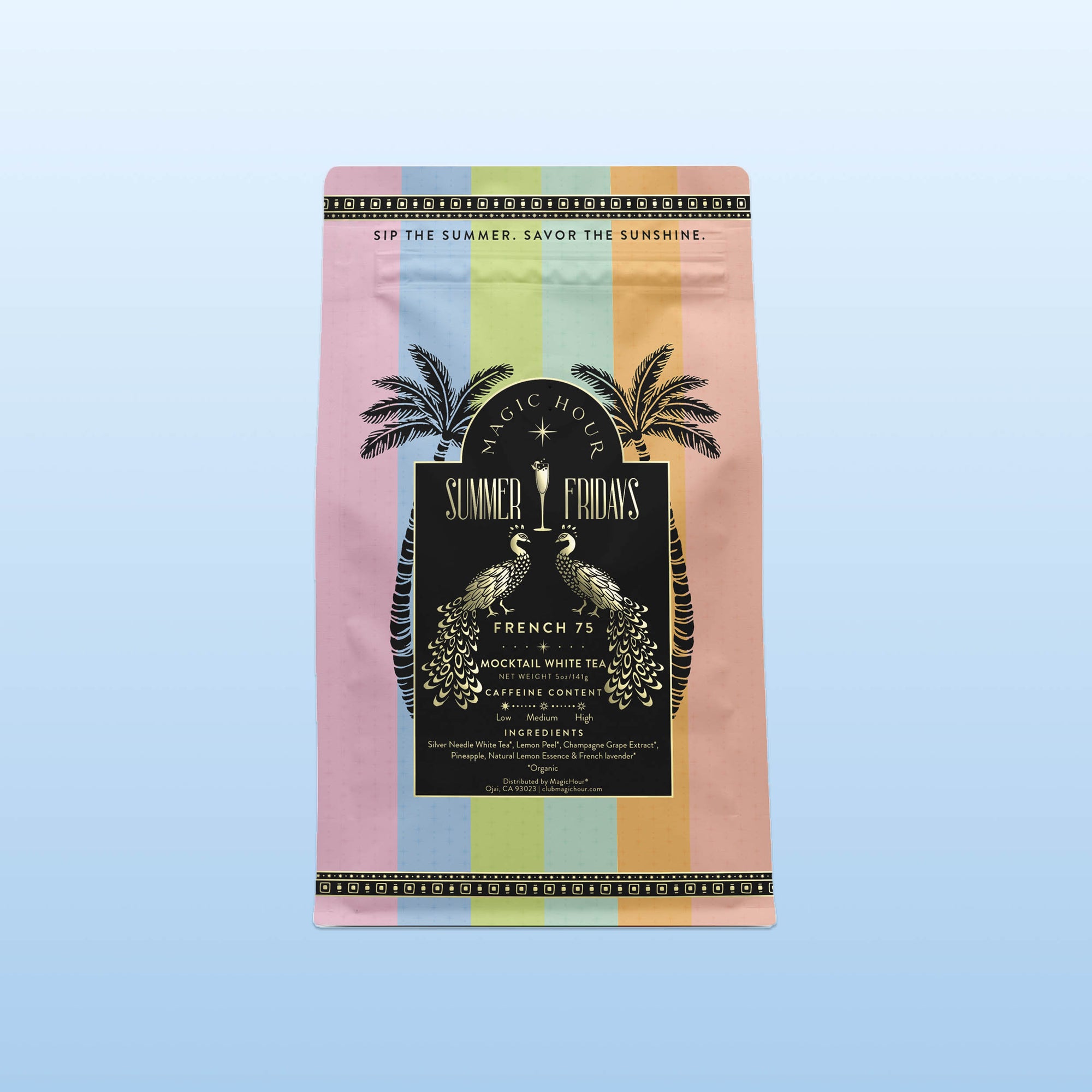 A pastel pouch with vertical stripes, palm trees, and peacocks features a black label: “Summer Fridays™: French 75,” highlighting wellness mocktail notes, cocktail white tea details, and gold accents.