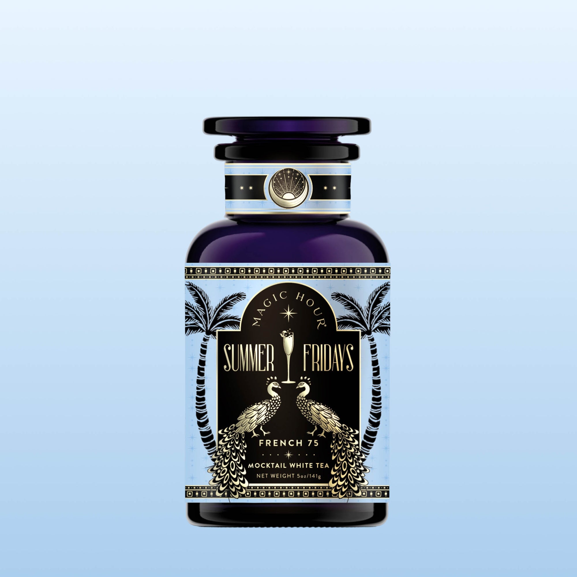 A dark blue bottle labeled "Summer Fridays™: French 75" with gold peacocks, palm trees, and black-gold accents rests on a light blue gradient background—ideal for a refreshing wellness mocktail.
