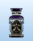 A dark blue bottle labeled "Summer Fridays™: French 75" with gold peacocks, palm trees, and black-gold accents rests on a light blue gradient background—ideal for a refreshing wellness mocktail.