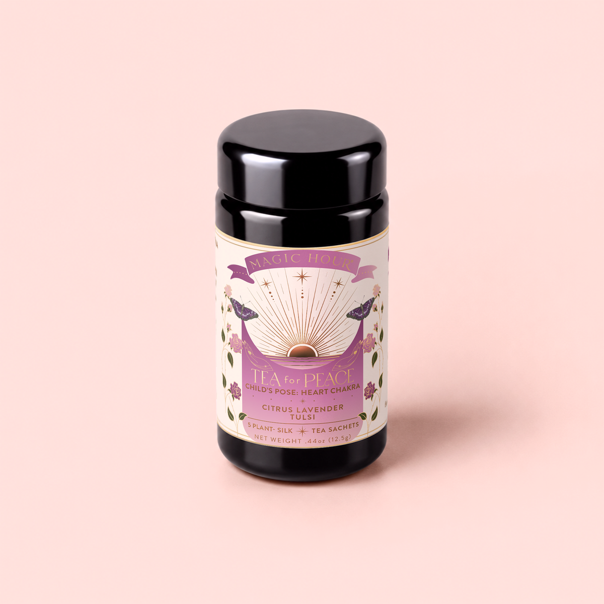 A canister of Tea for Peace: Child’s Pose—Citrus, Lavender & Tulsi Herbal Tea Blend—adorned with a purple, gold, and floral design, rests on a soft pink background. The label highlights citrus lavender notes, 8 plant silk tea sachets, and heart chakra themes—an adaptogenic blend carefully crafted to relax your nervous system and nurture inner calm.