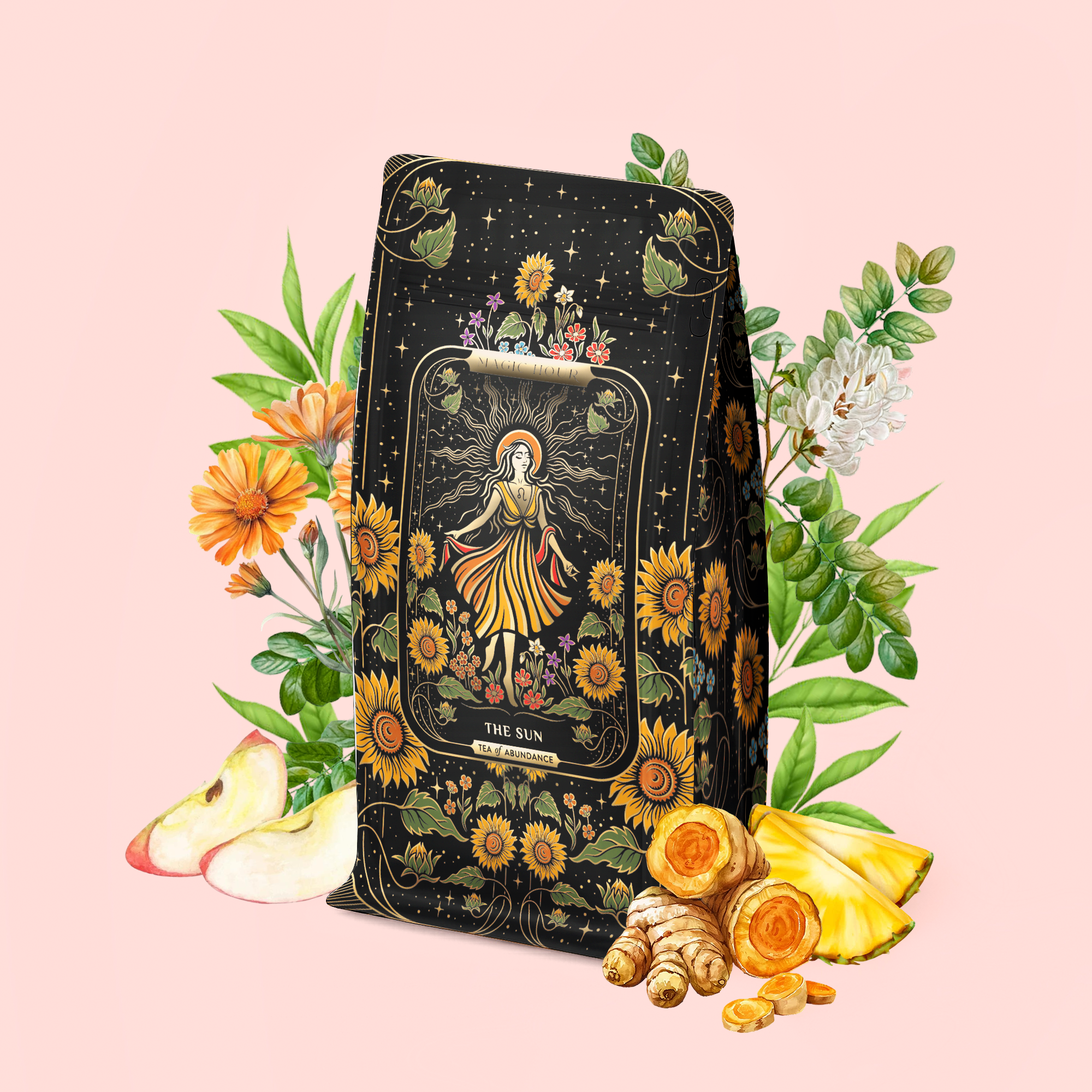 A vibrant package of "The Sun: Energizing Adaptogenic Herbal Tea with Yaupon, Moringa &amp; Turmeric," featuring a sun design, is surrounded by flowers, apple slices, turmeric blend, pineapple, ginger, and green leaves—all arranged on a soft pink background.