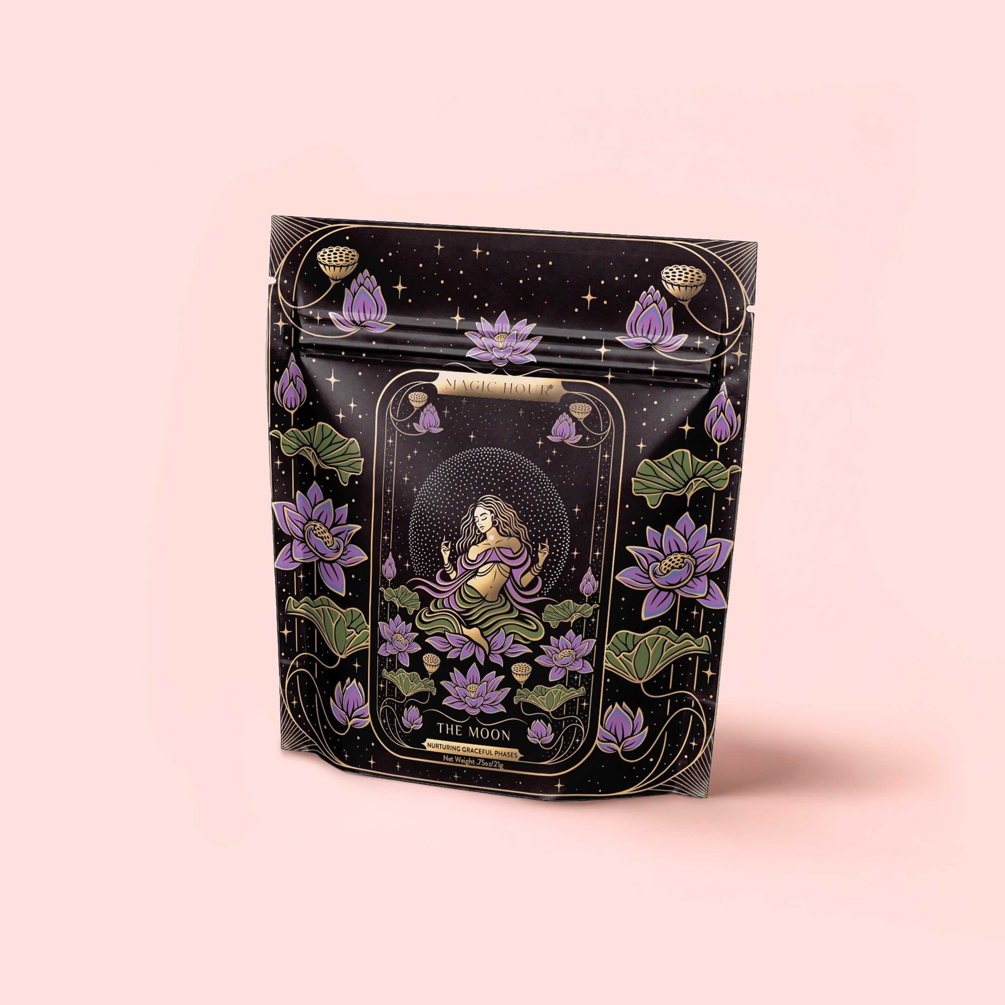 A black resealable bag with purple lotus and a mystical woman under a starry sky, labeled "The Moon - Tea for Nurturing Graceful Phases," hints at a calming herbal blend with butterfly pea flower, set on a pale pink background.