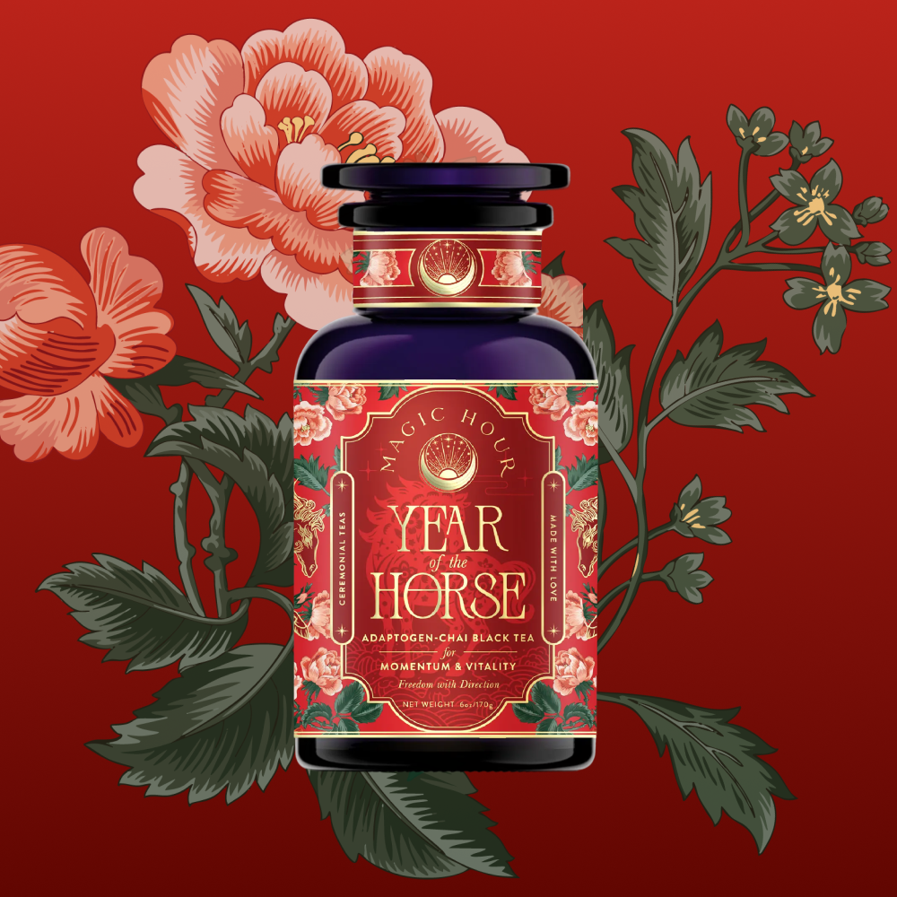 The Year of the Horse: Adaptogen Chai Black Tea comes in a decorative tea jar with floral designs and red accents, set against a red background with illustrated flowers and leaves.