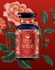 The Year of the Horse: Adaptogen Chai Black Tea comes in a decorative tea jar with floral designs and red accents, set against a red background with illustrated flowers and leaves.