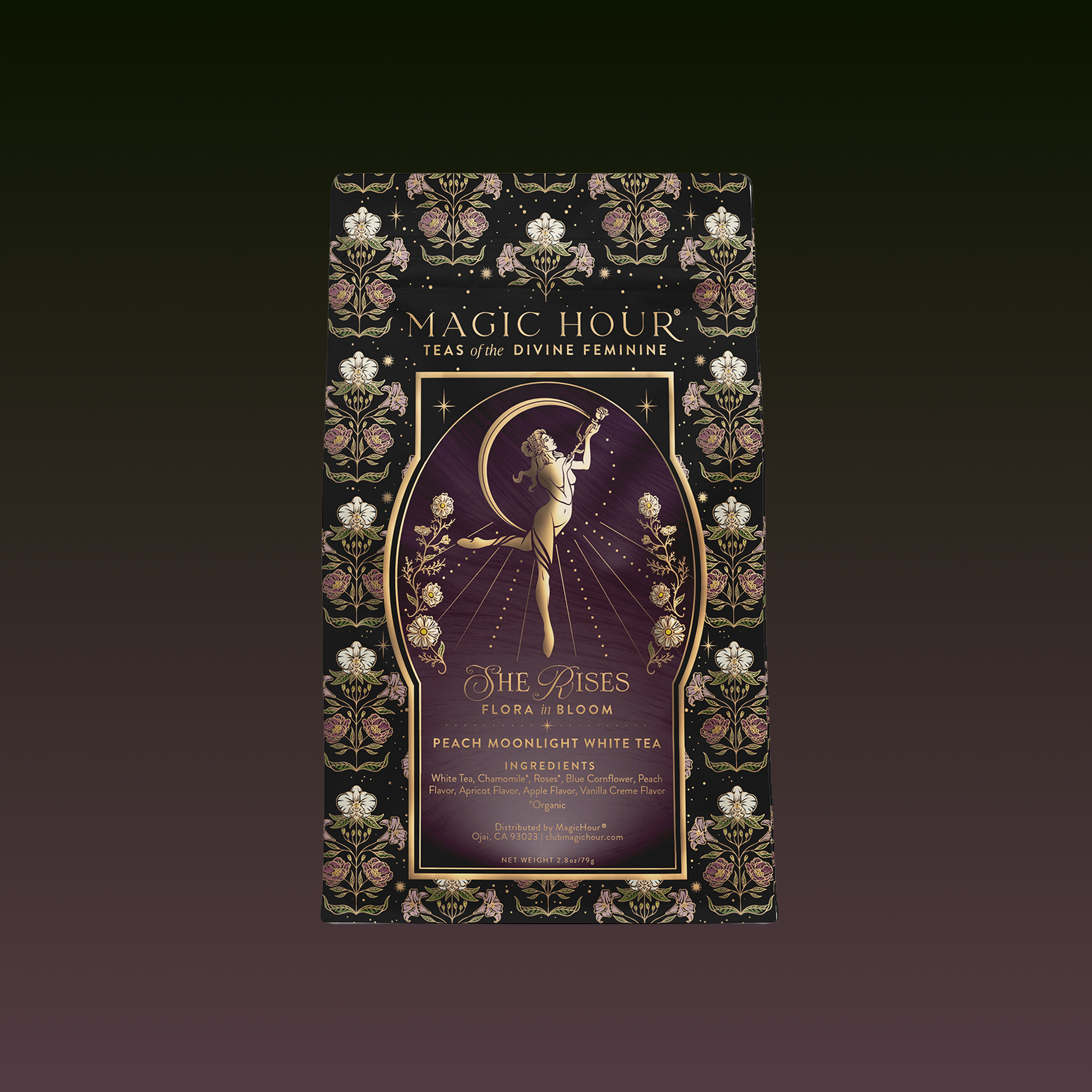 A black and gold package for the Monthly Magic Tea Journey Subscription features floral patterns, rare botanicals, and a goddess-like woman reaching upward inside a gold frame.