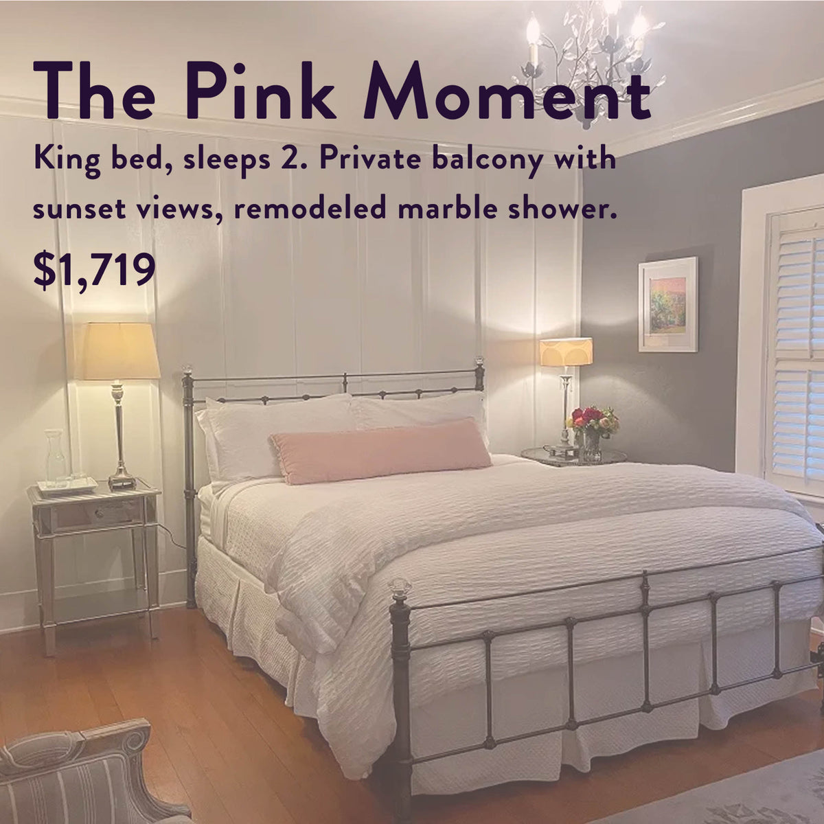 Experience a luminous bedroom in “The Soul of Tea: A Two Day Retreat in Ojai, CA,” featuring a king bed with crisp white bedding, two side tables topped with elegant lamps, a chandelier overhead, artwork adorning the walls, and sunlight streaming through the windows. This luxurious $1,719 escape includes an exclusive signature tea blend, making it the perfect setting for a tranquil tea retreat.