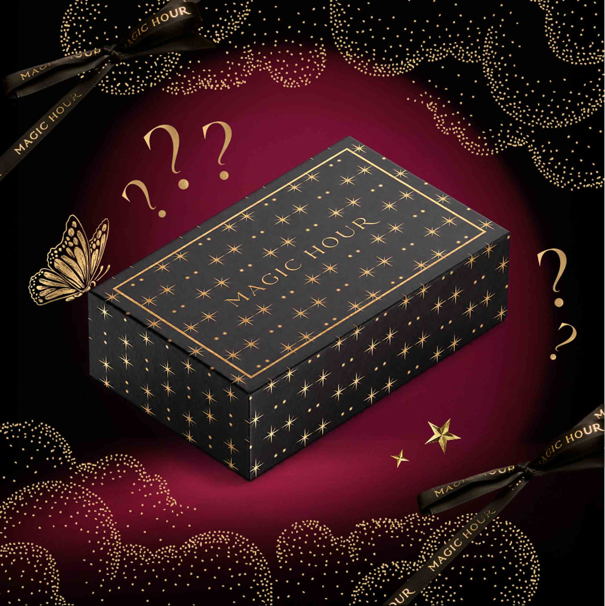 A black rectangular Spellbound Sips Mystery Box: Halloween Tea & Ritual Gifts decorated with gold stars and constellations, surrounded by scattered question marks, a gold butterfly, and ribbons on a deep red background.