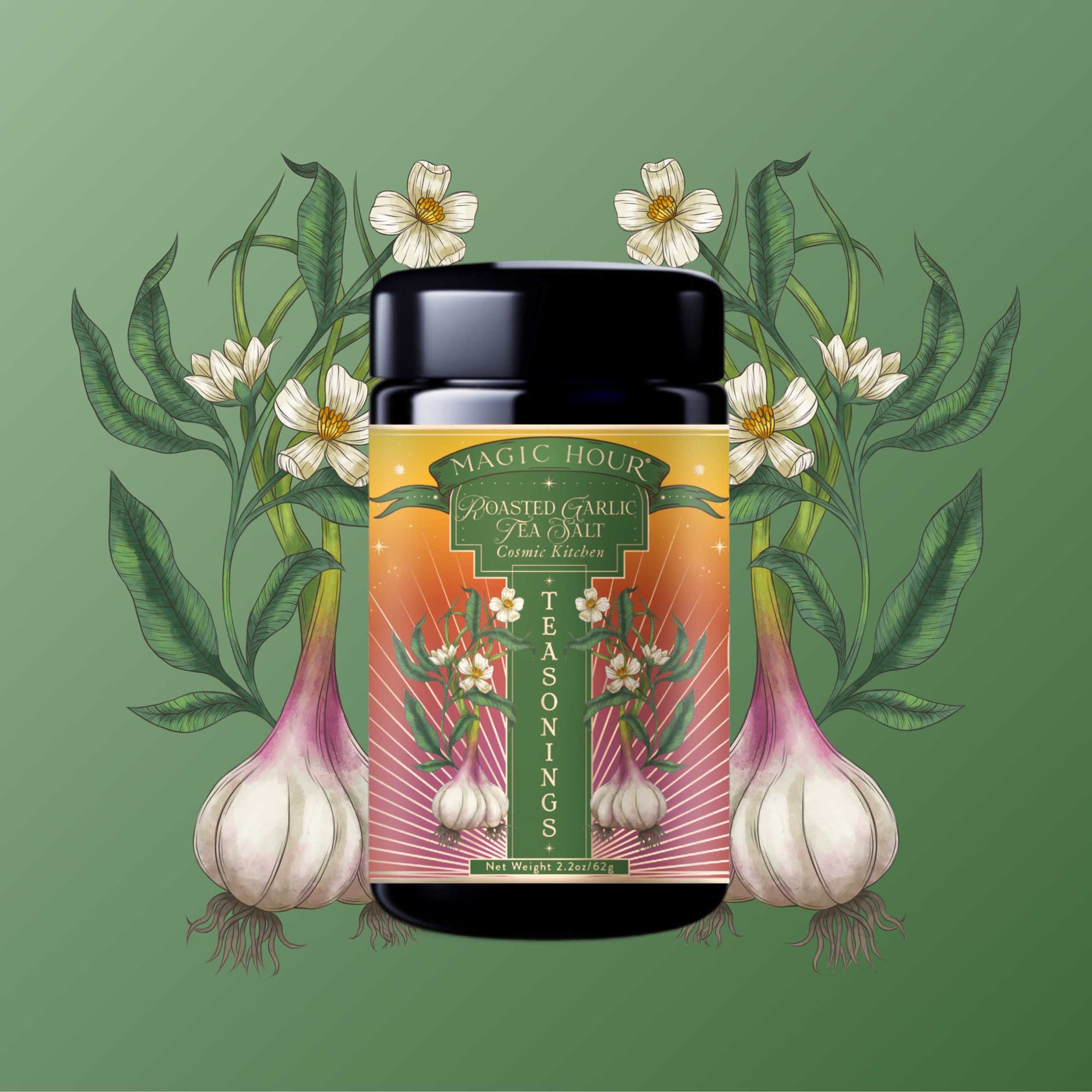 A jar of "Teasoning: Roasted Garlic Tea Salt" sits centered on a green background, framed by illustrated garlic bulbs and white flowers with leaves, capturing the savory essence of a garlic finishing salt.