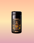 Black coffee canister with decorative label on a gradient background